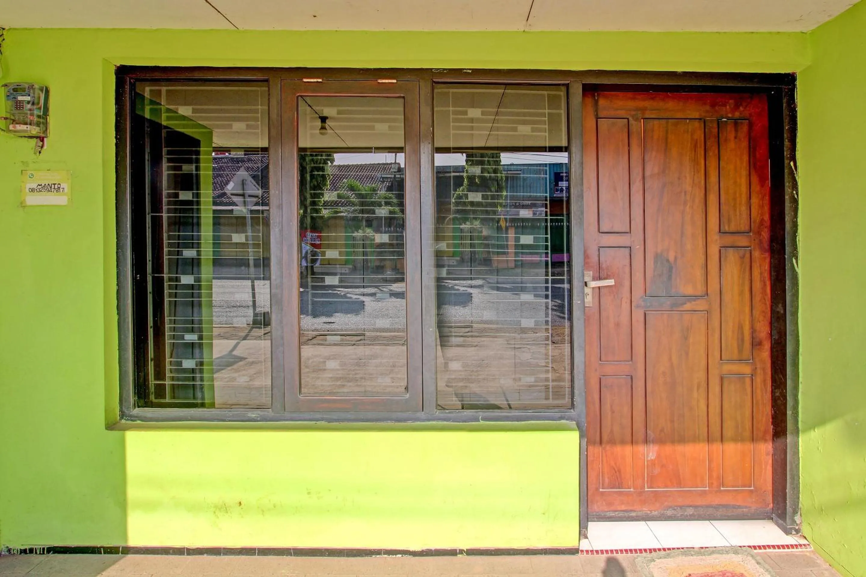 Facade/entrance in SPOT ON 91521 Mayong Guesthouse