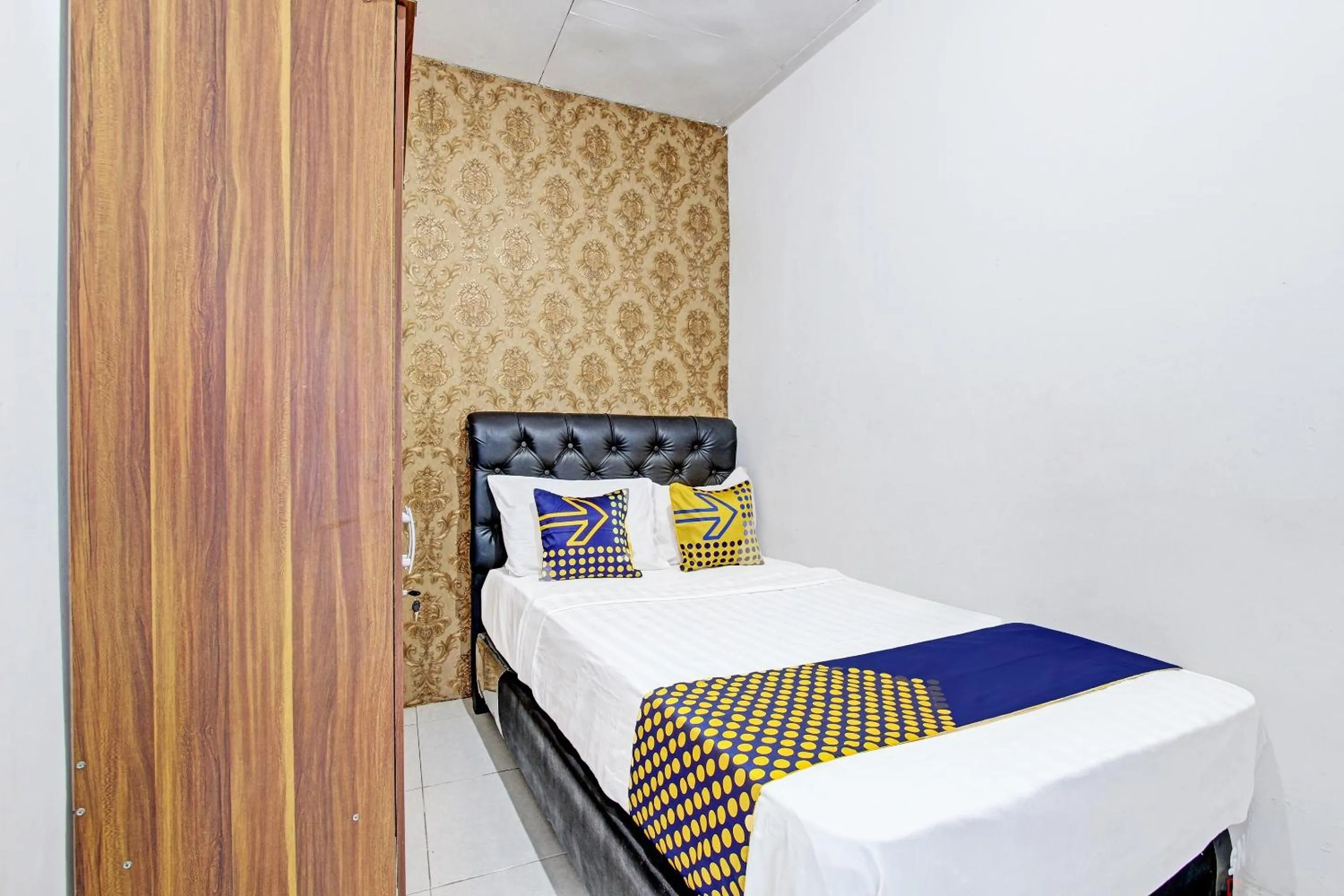 Bedroom, Bed in SPOT ON 91521 Mayong Guesthouse