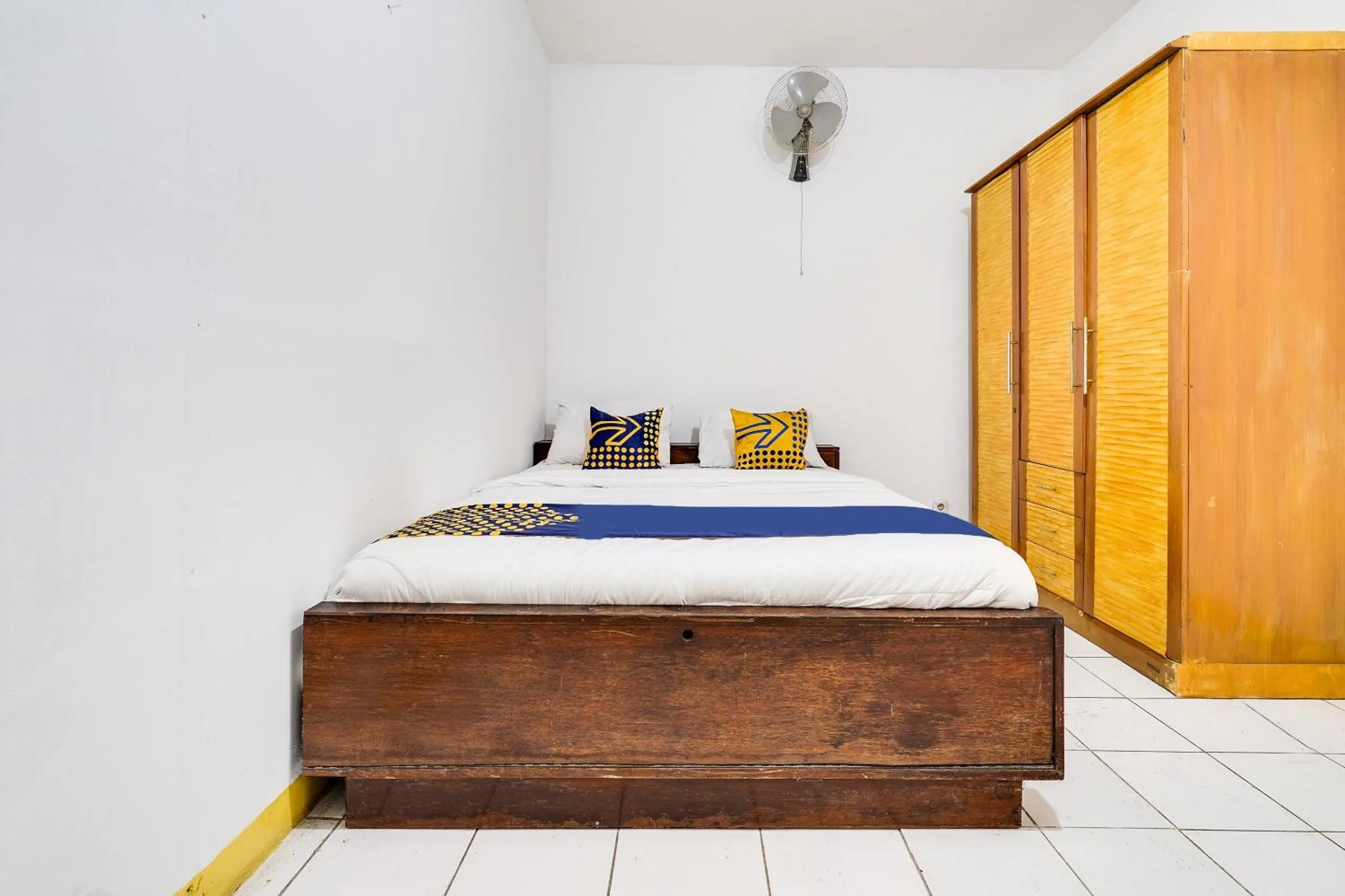 Bedroom in OYO 91546 Dewi Sudirman Homestay