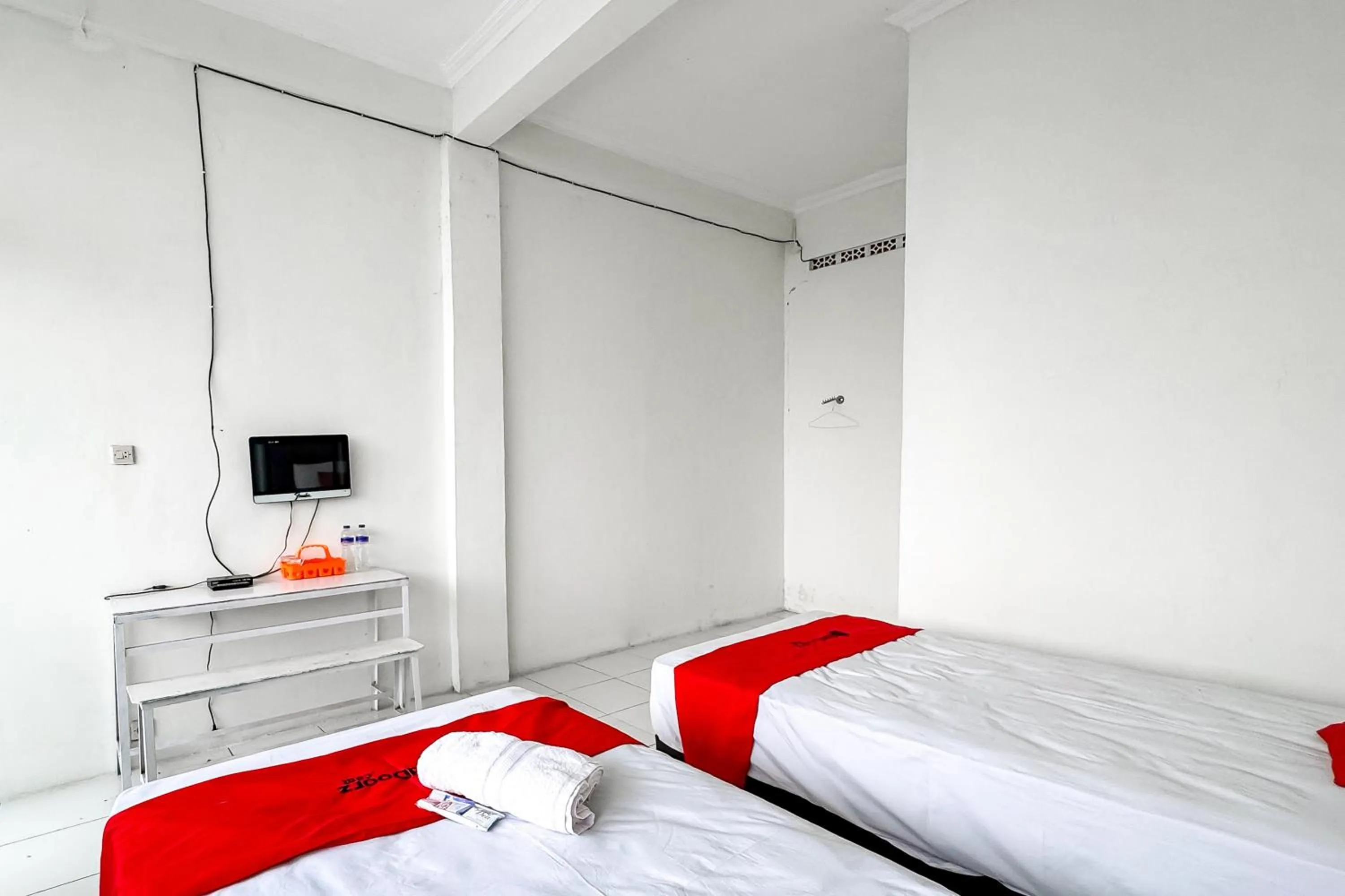 Bedroom, Bed in RedDoorz Syariah at Neu Hostel Cisarua Lembang