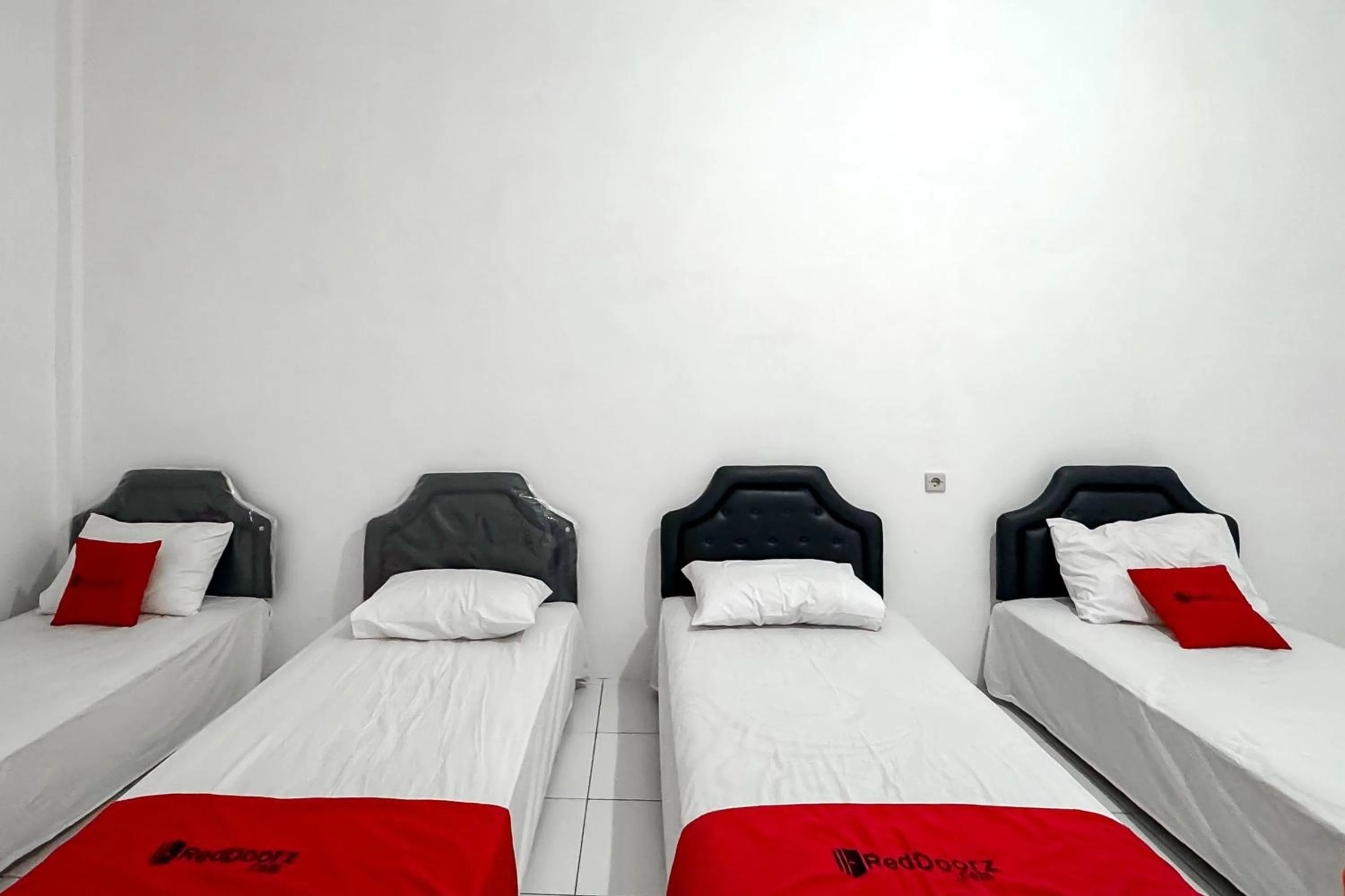 Bedroom, Bed in RedDoorz Syariah at Neu Hostel Cisarua Lembang