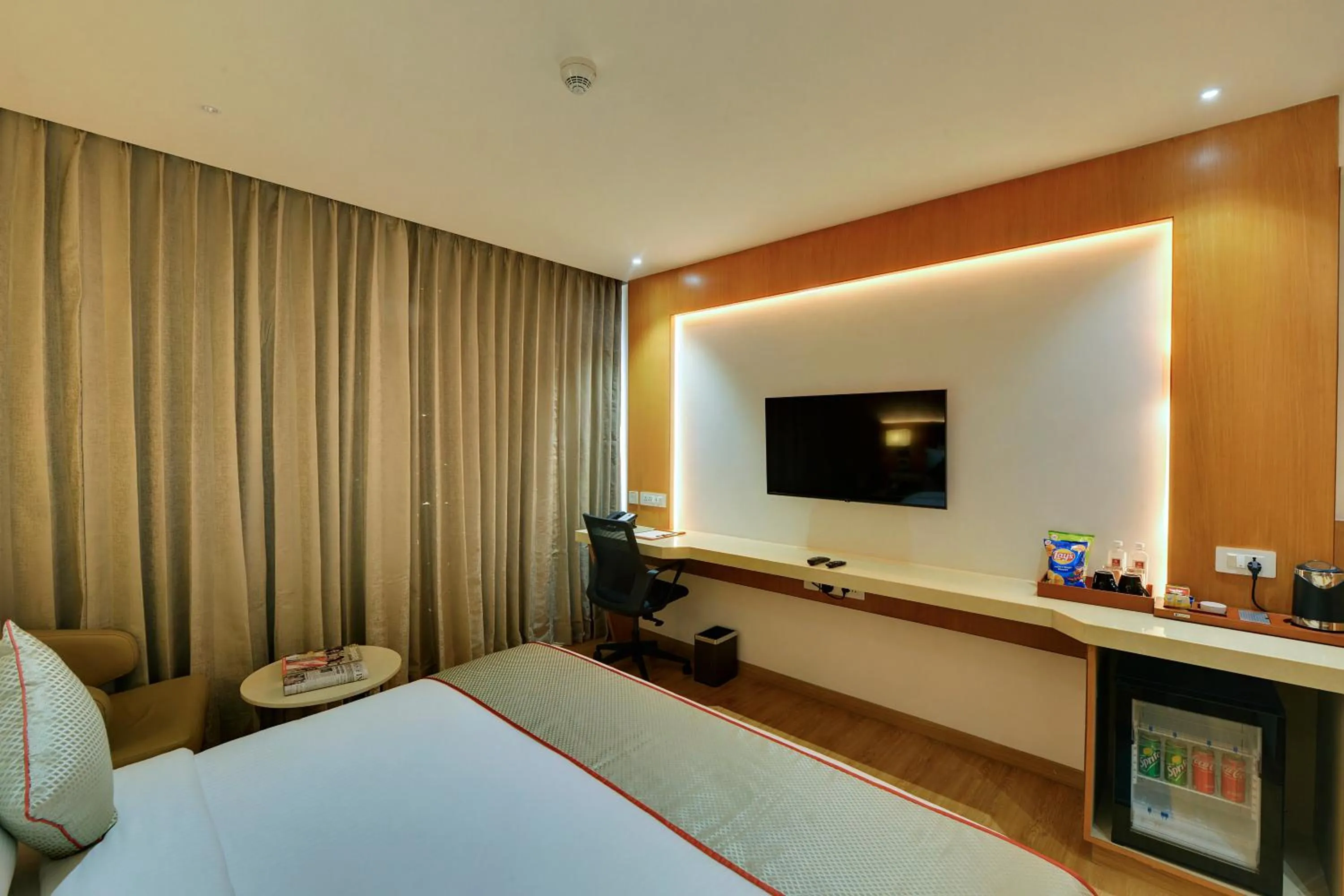 Bed in Clarion Hotel Bangalore