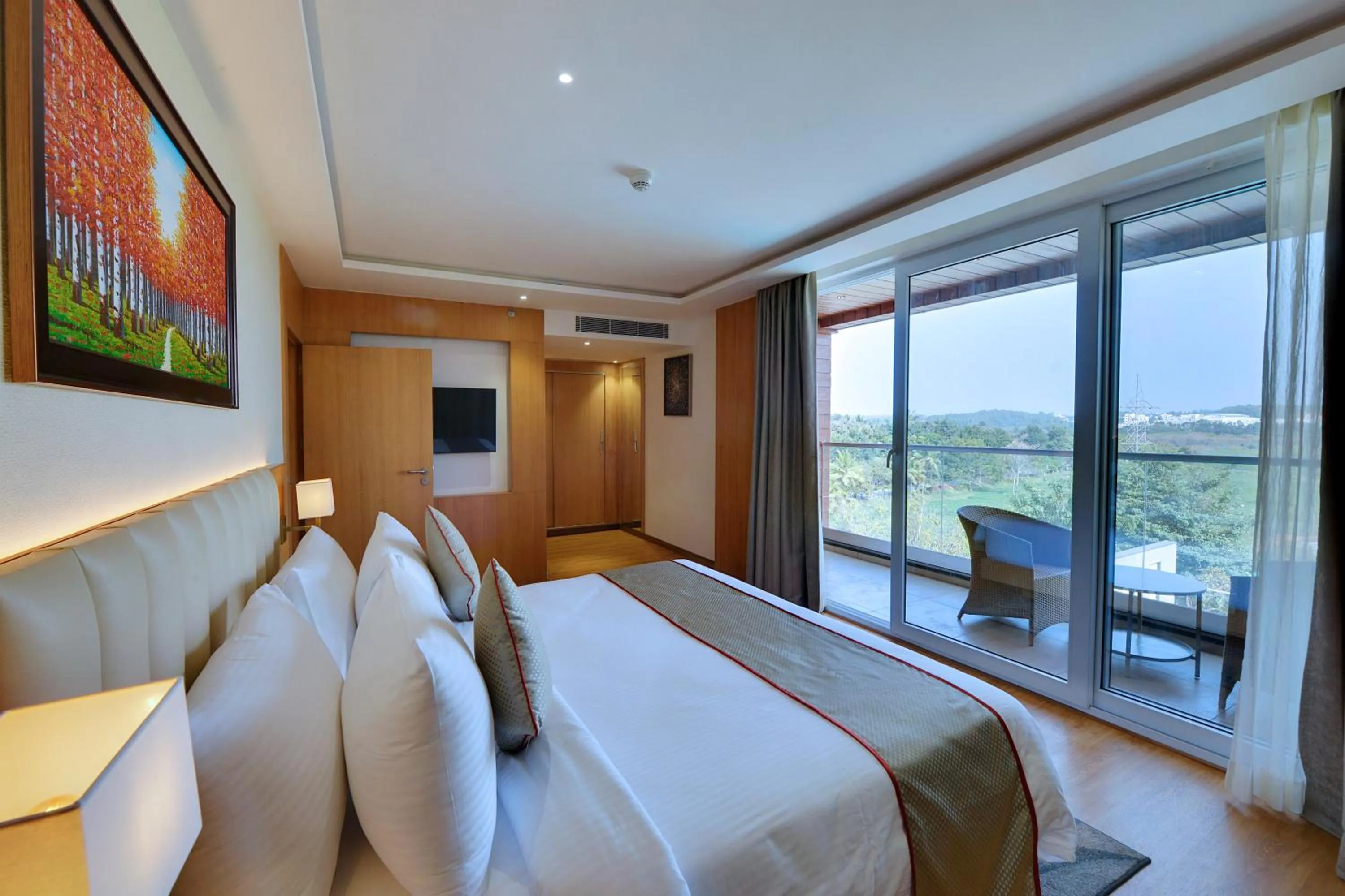 Bed in Clarion Hotel Bangalore