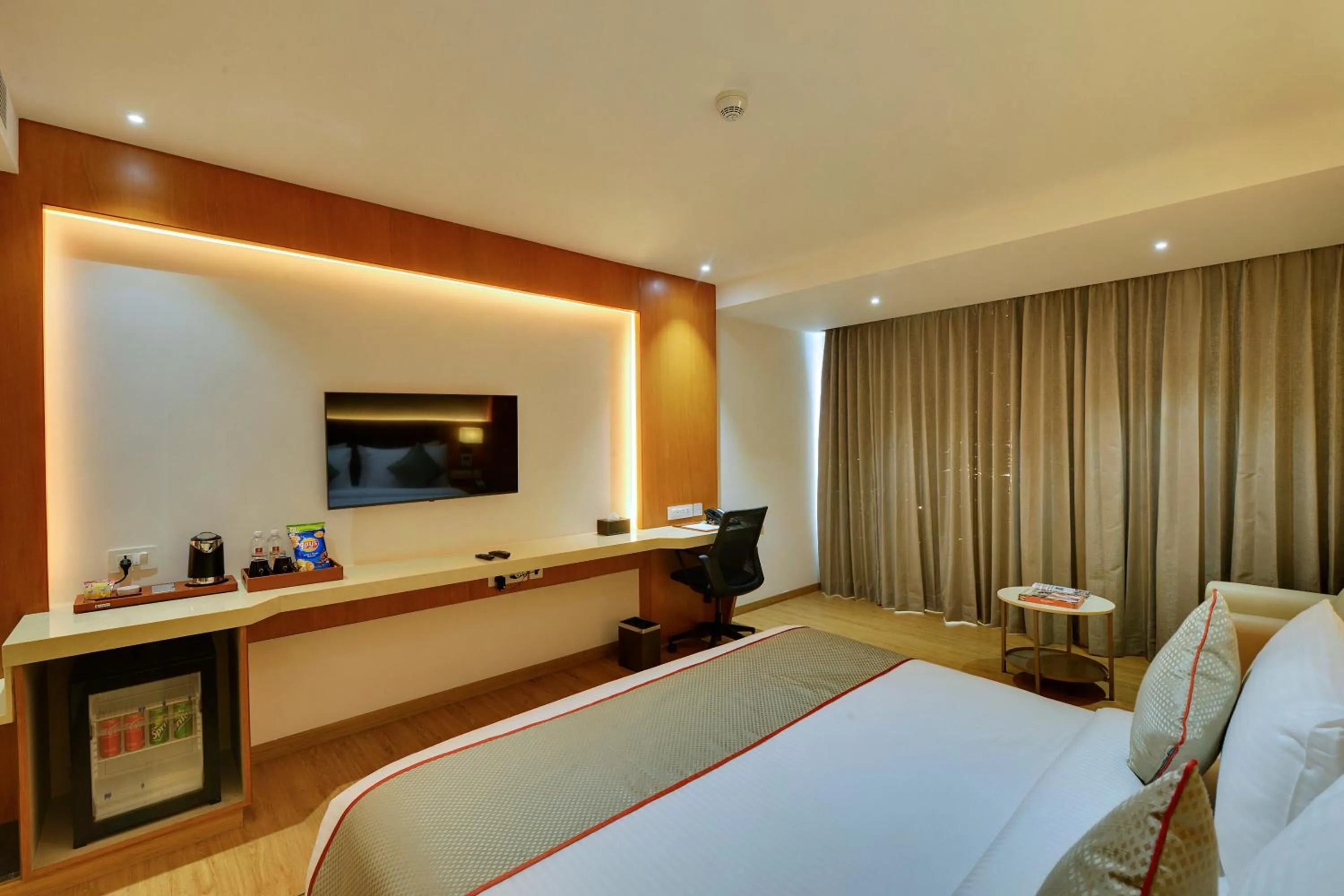Bed in Clarion Hotel Bangalore