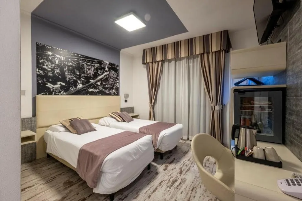 Bed in Hotel Le Palme Lago Maggiore