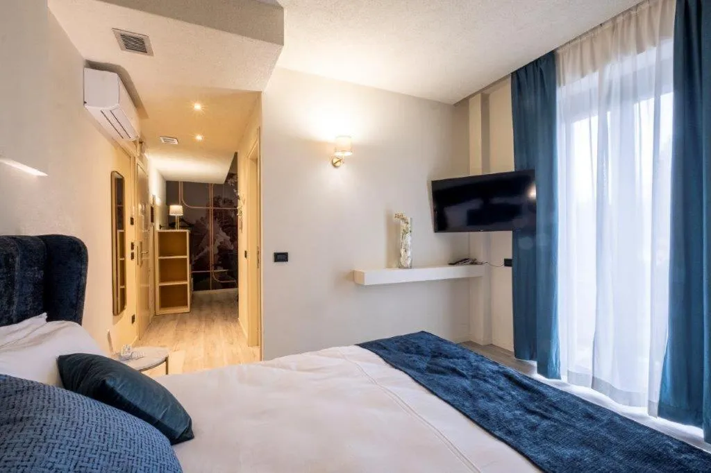 Bed in Hotel Le Palme