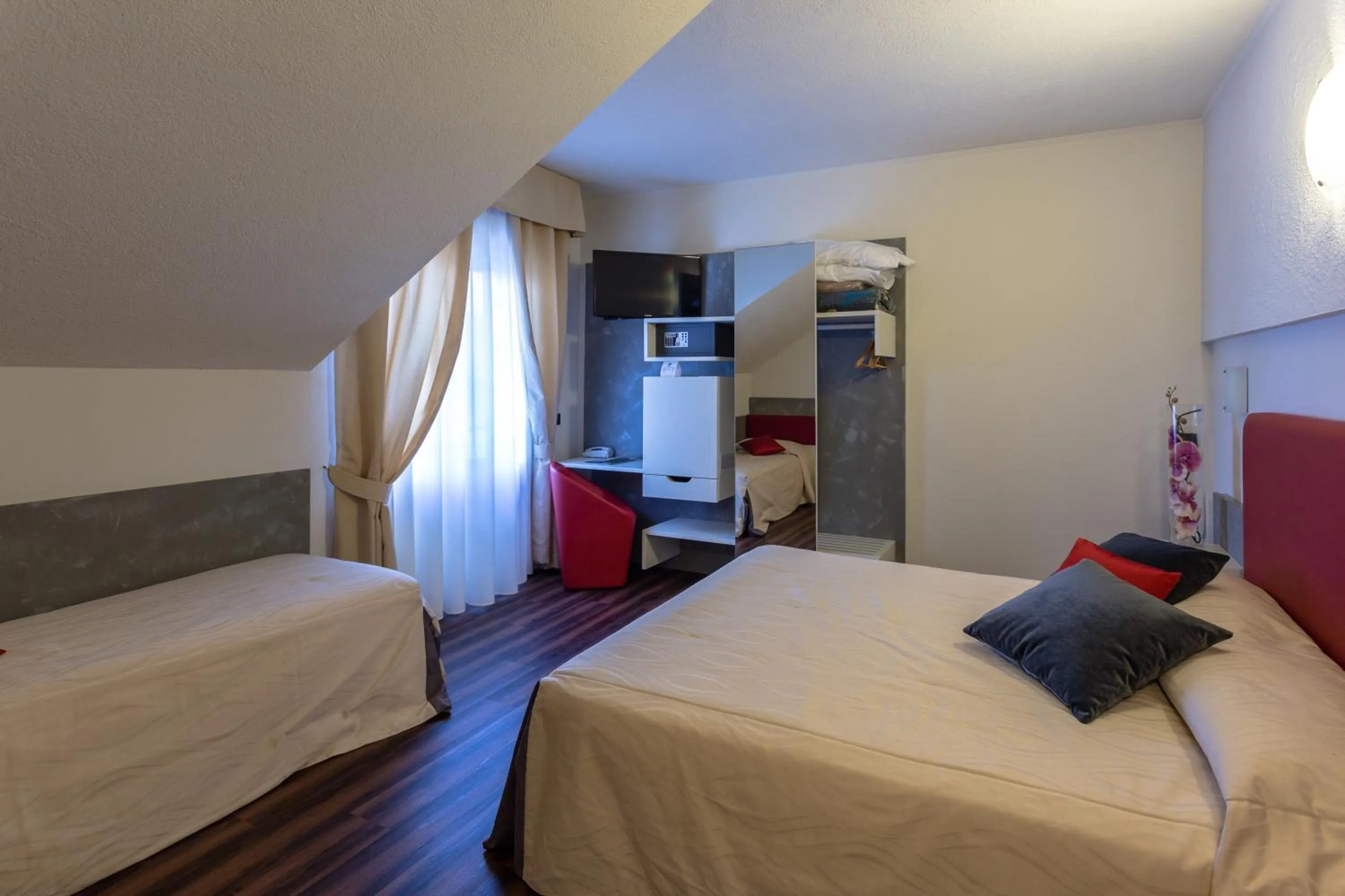 Bed in Hotel Le Palme