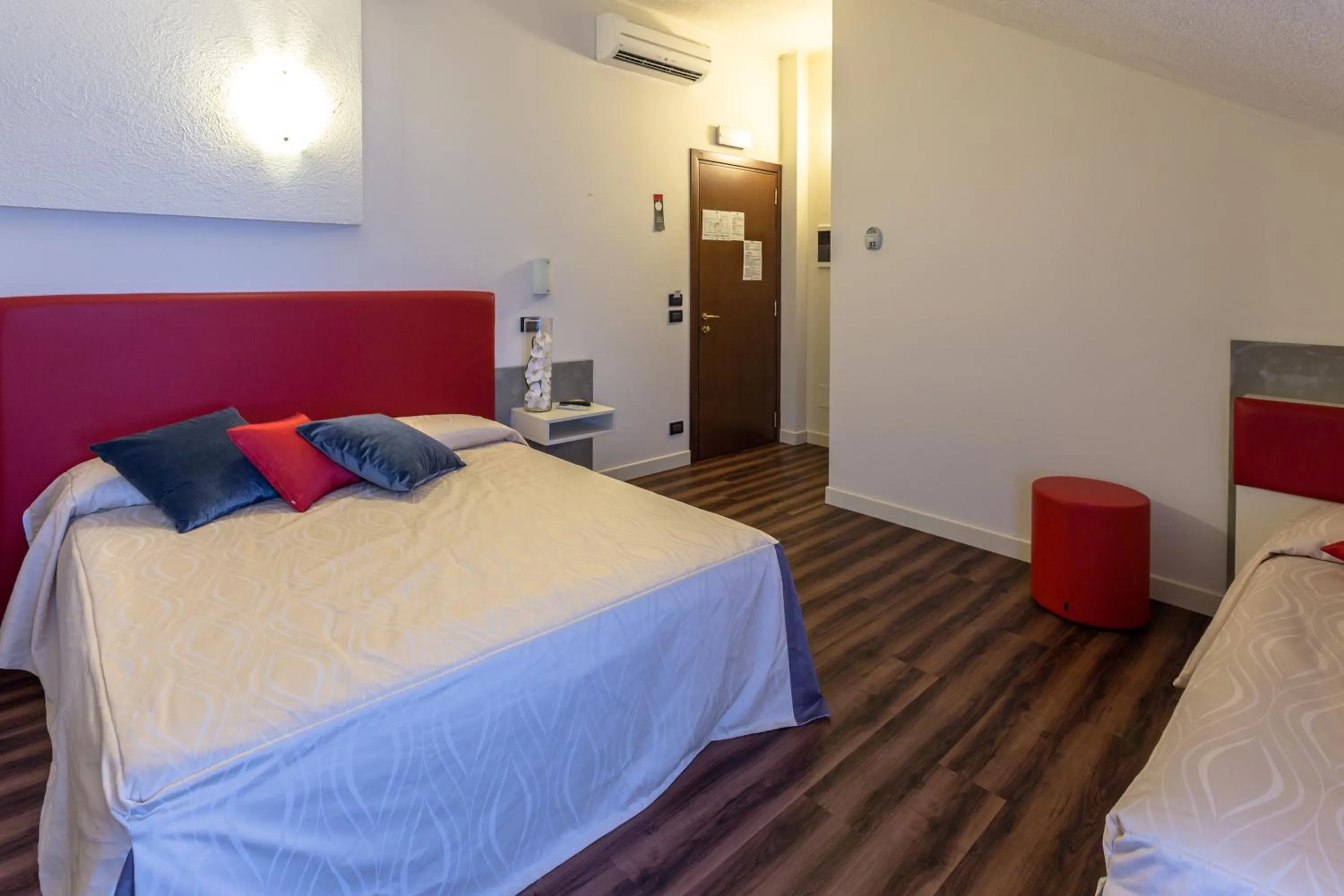 Bed in Hotel Le Palme