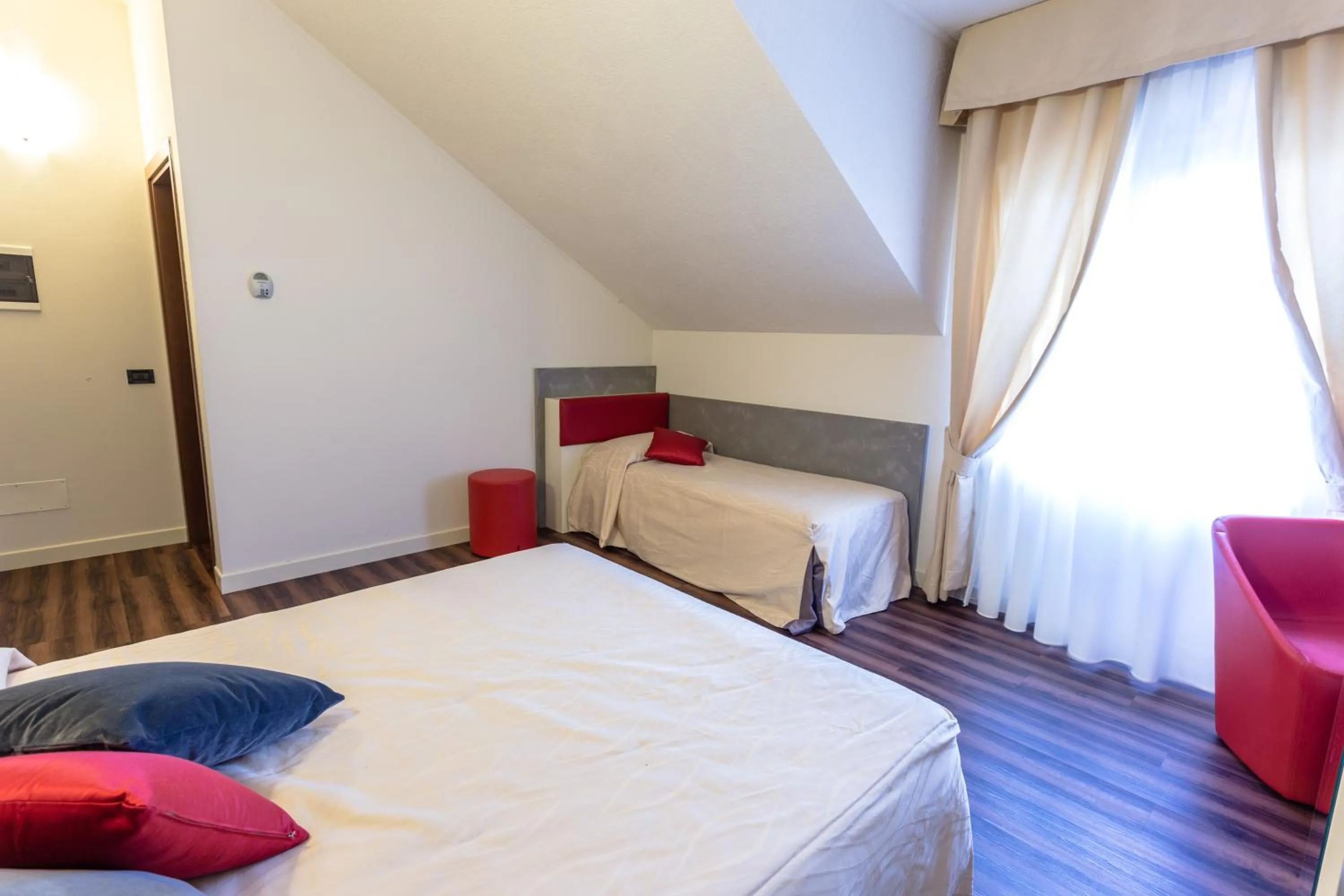 Bed in Hotel Le Palme