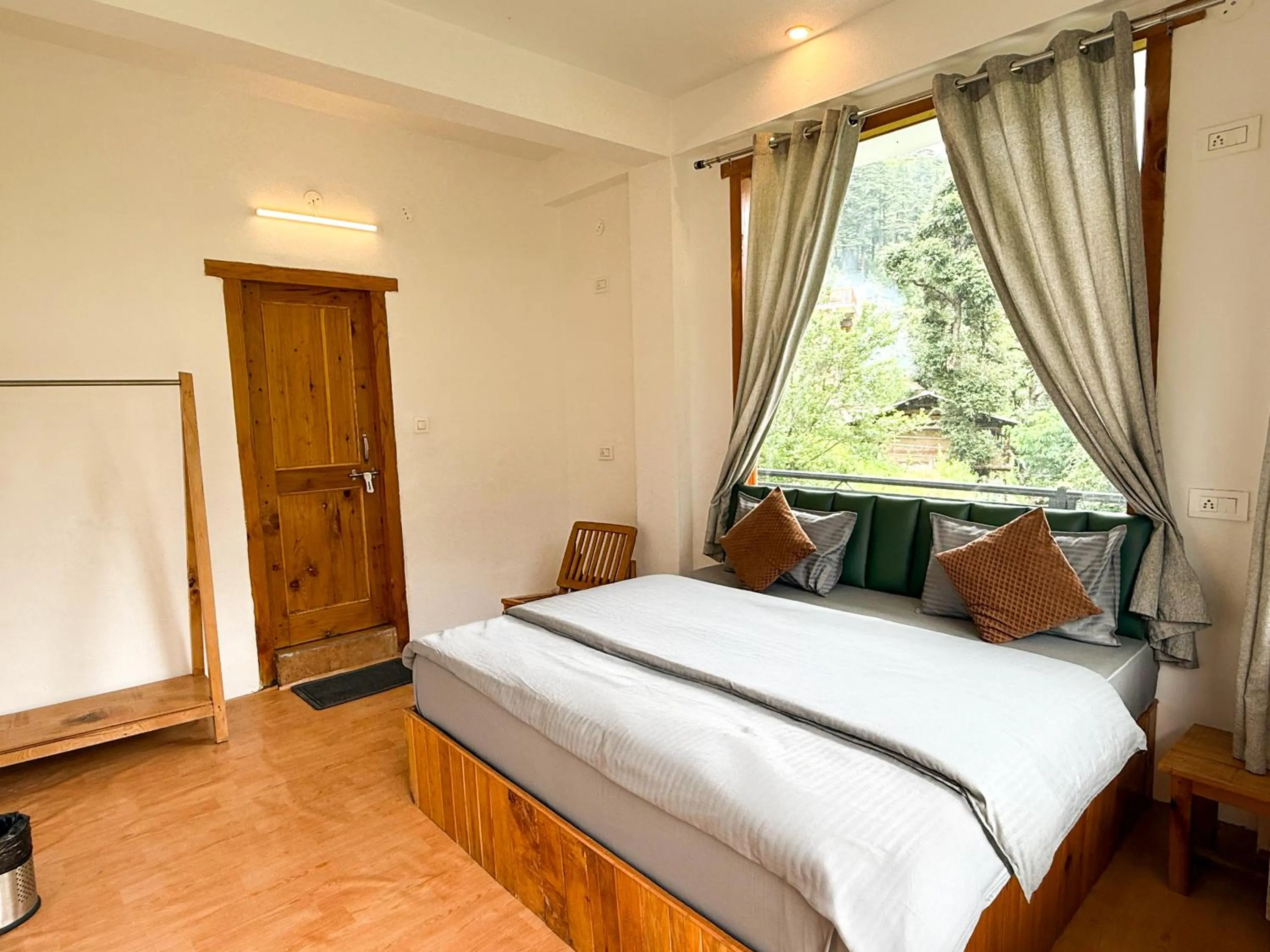 Bed in Young Monk Homestay Jibhi