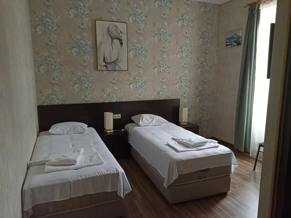 Bed in Hotel Guri