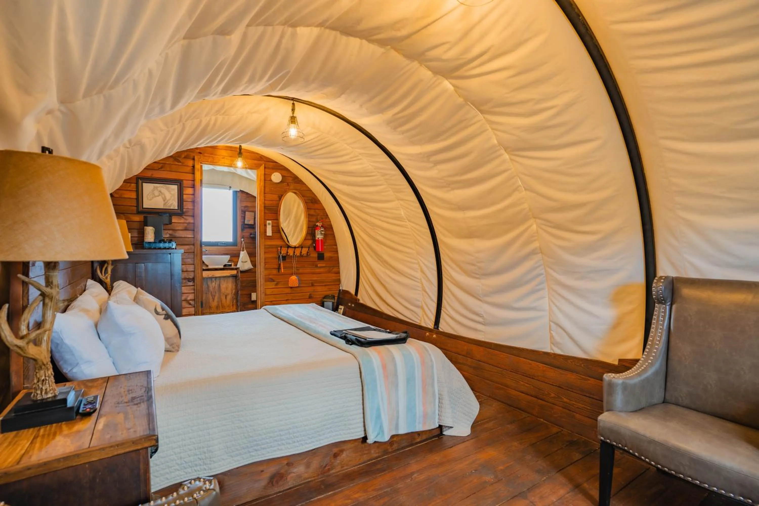 Bed in Zion White Bison Glamping & RV Resort