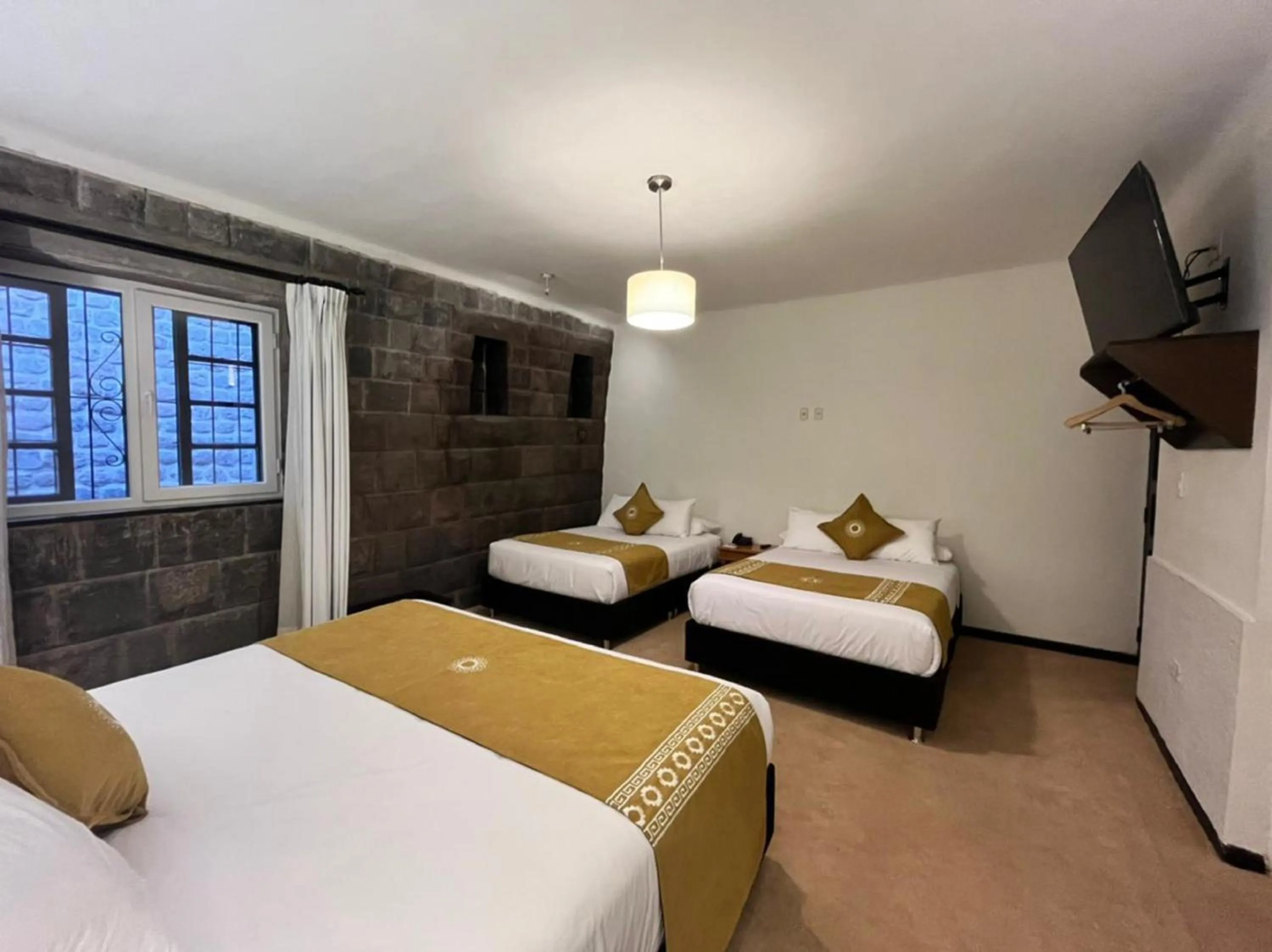 Photo of the whole room, Bed in Katari at Plaza de Armas Cusco