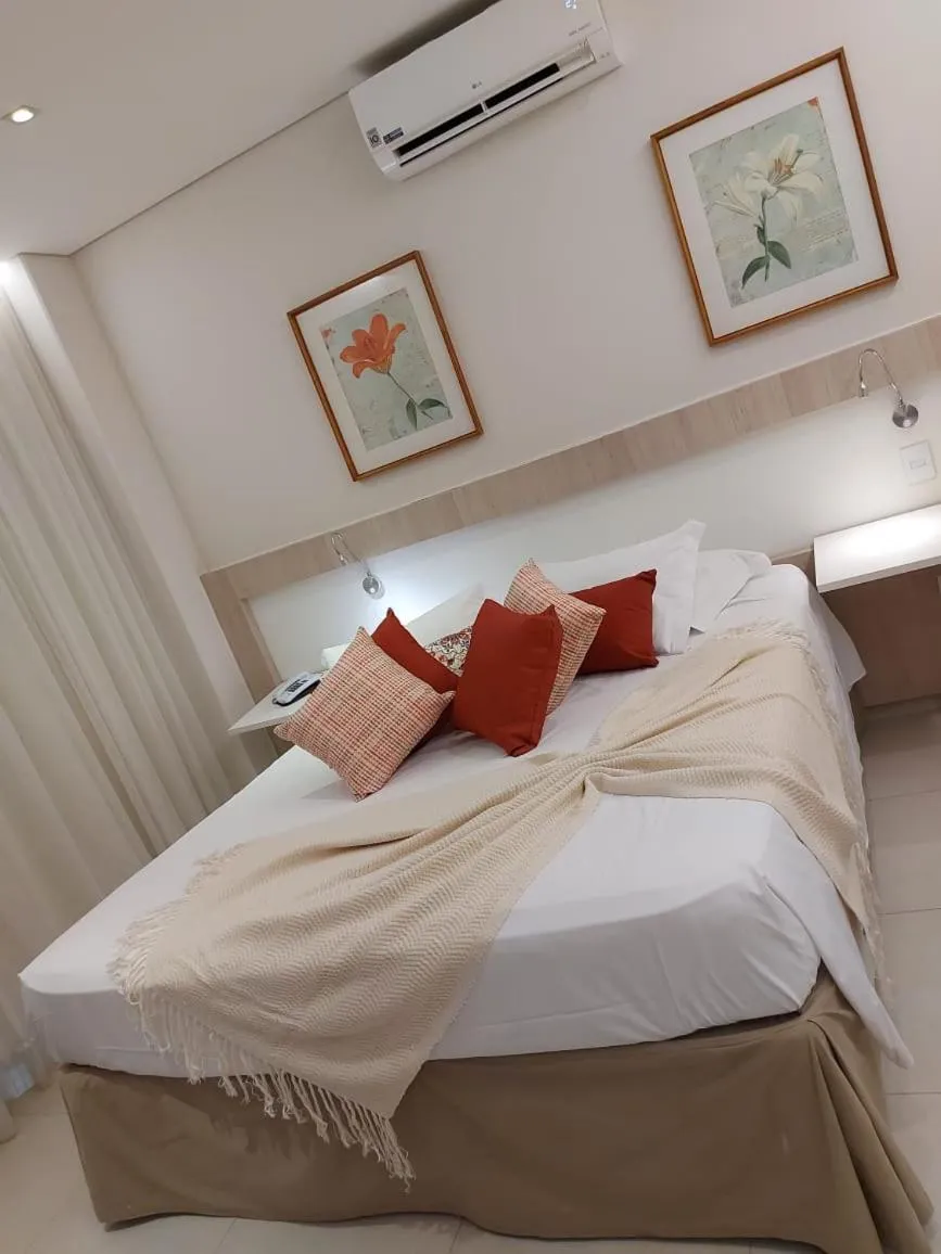 Bed in Lirio D'Água Hotel