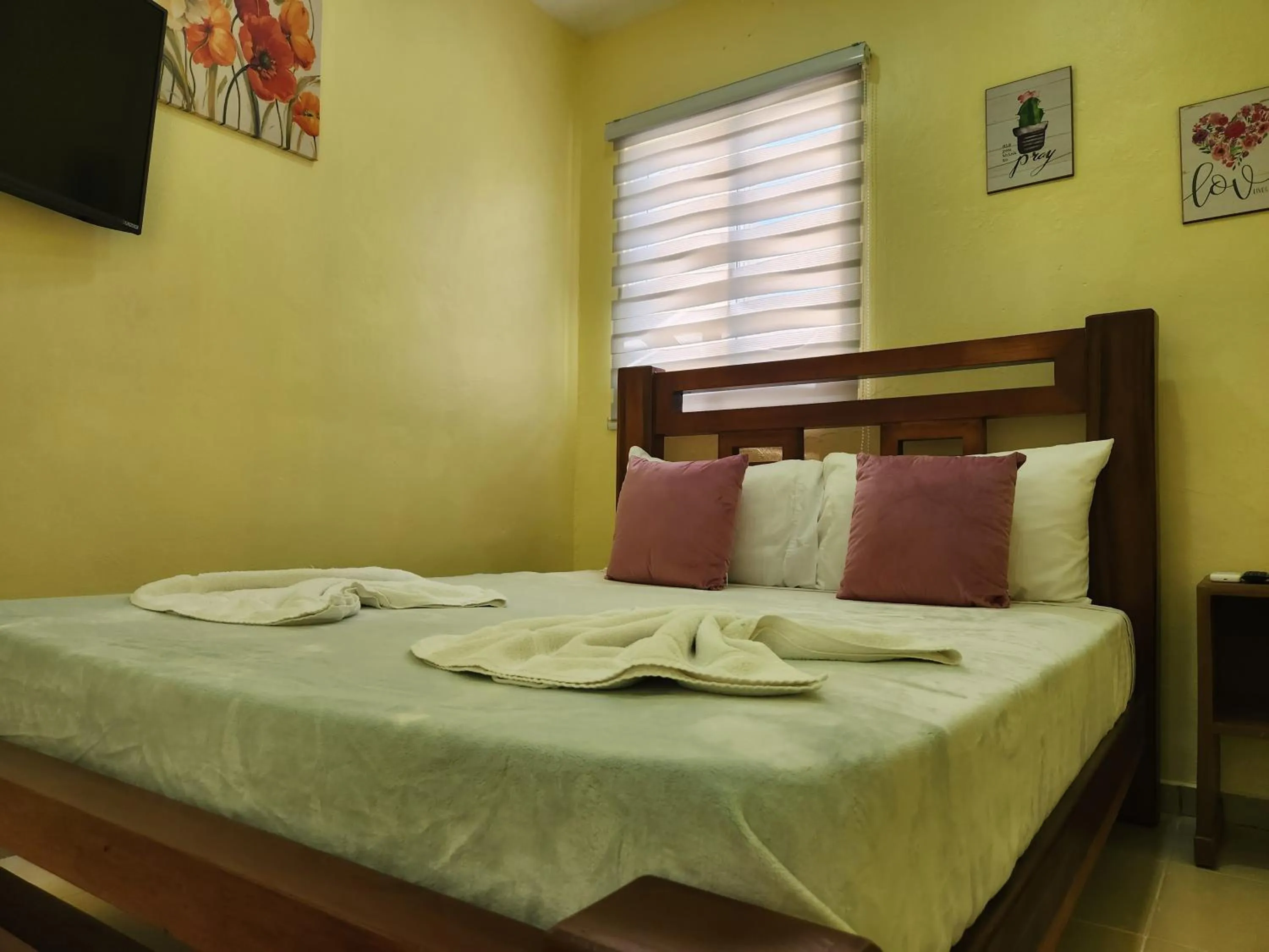 Bed in Apartamentos Melya cerca de la Playa Caleta