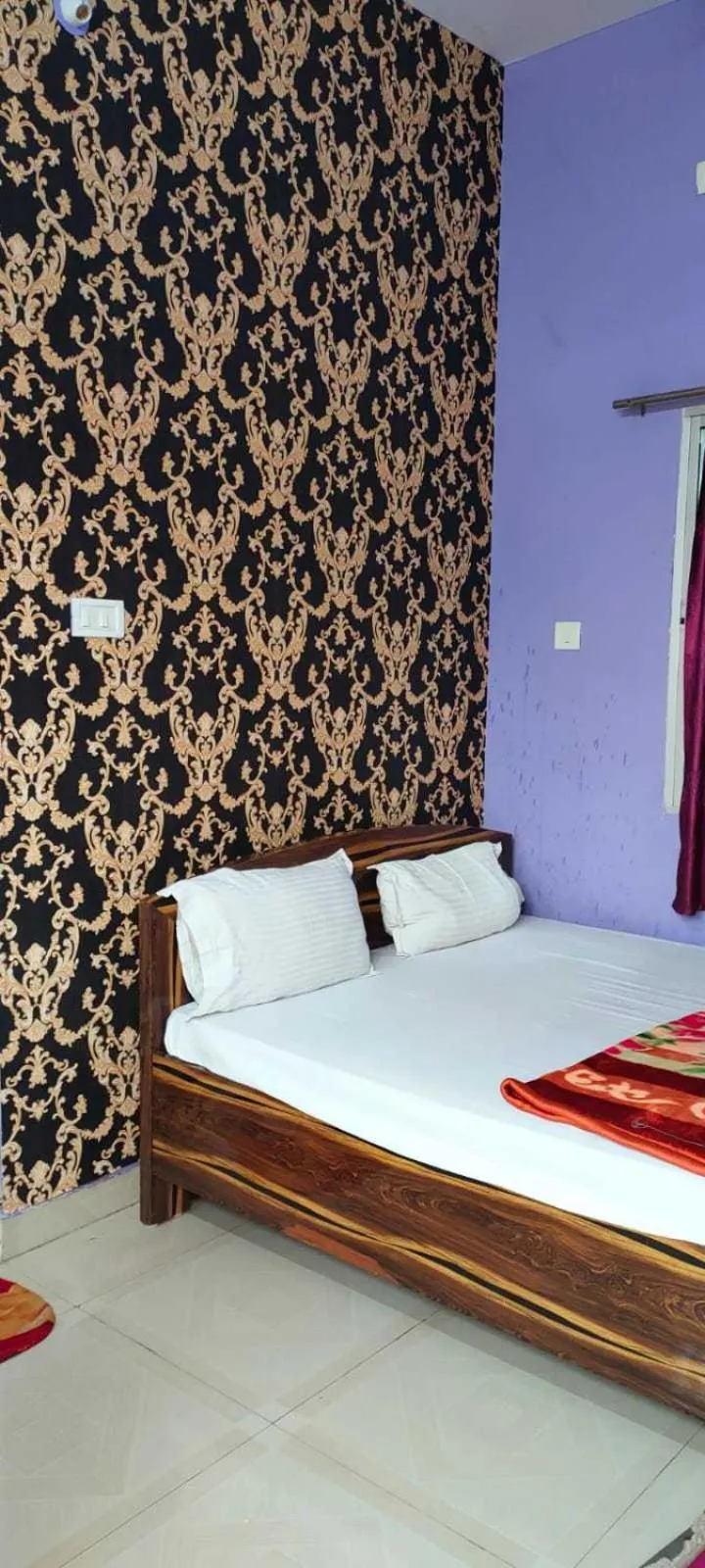 Bedroom in HOTEL O PRIYAL INn