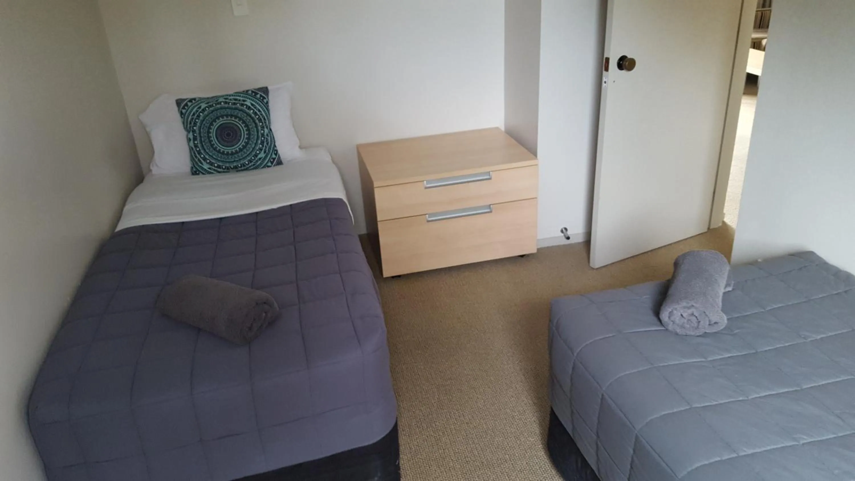 Bed in Akaroa Waterfront Motels