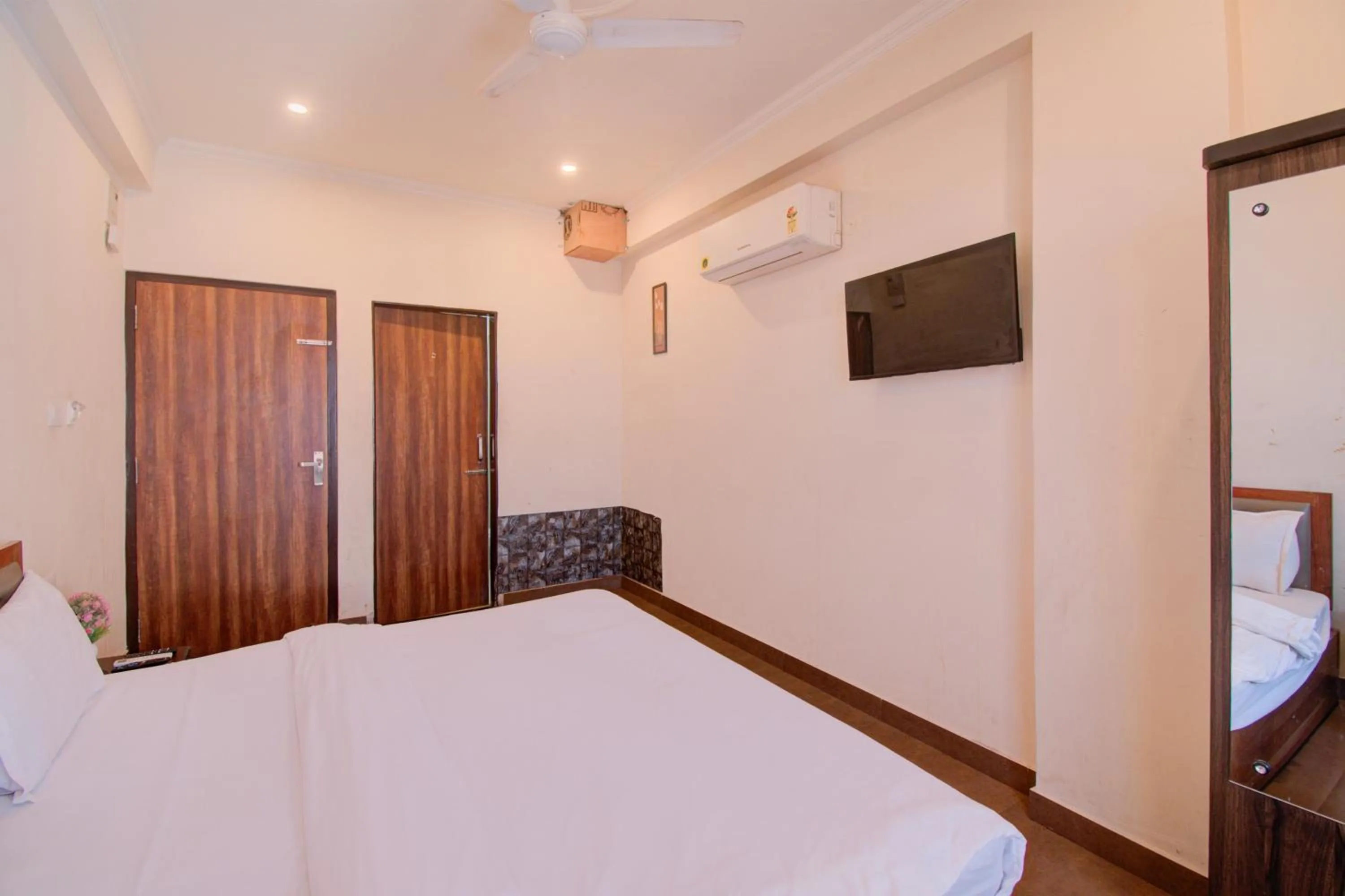 Bed in Hotel Bhagwati Palace