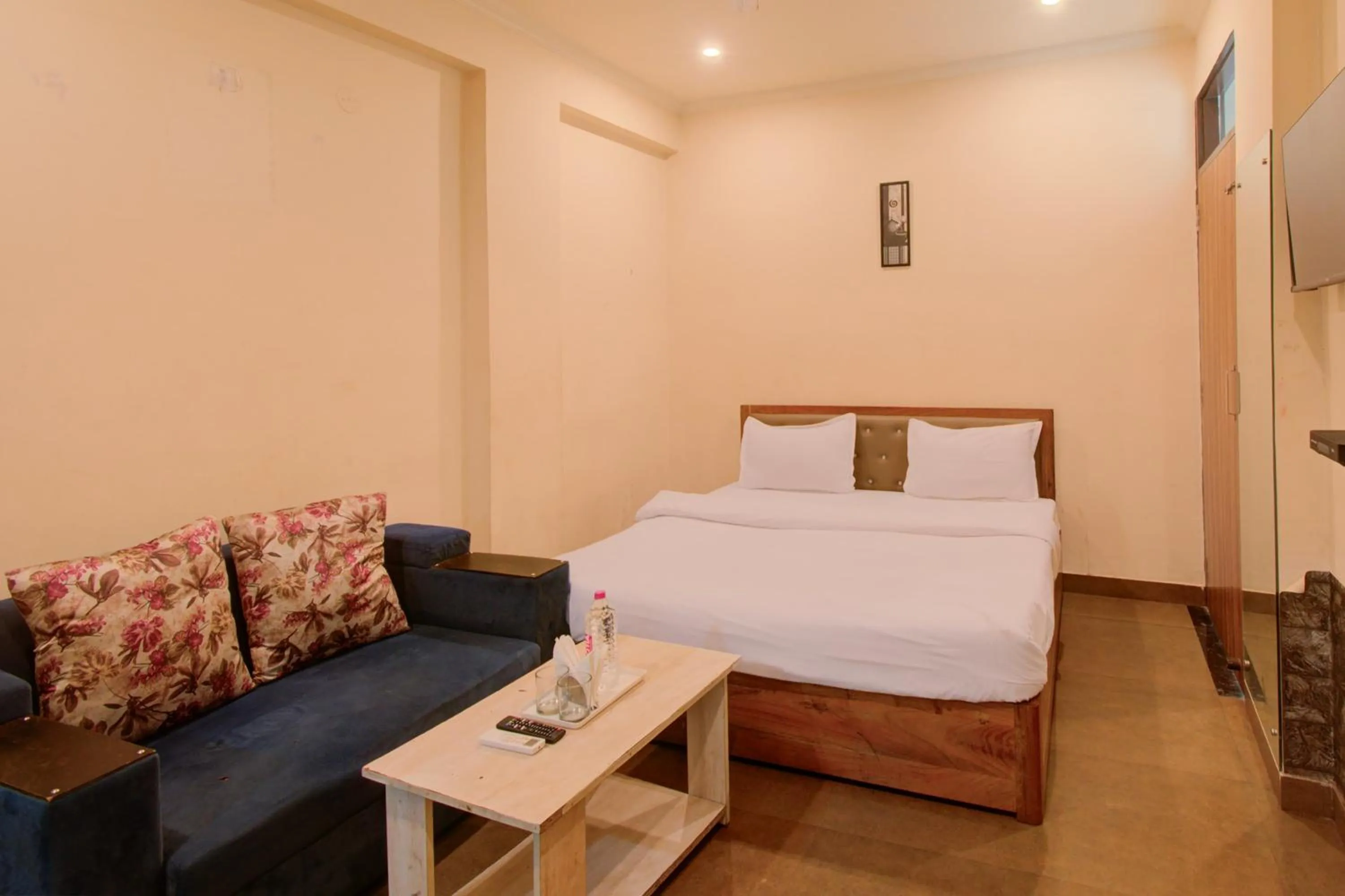 Bed in Hotel Bhagwati Palace