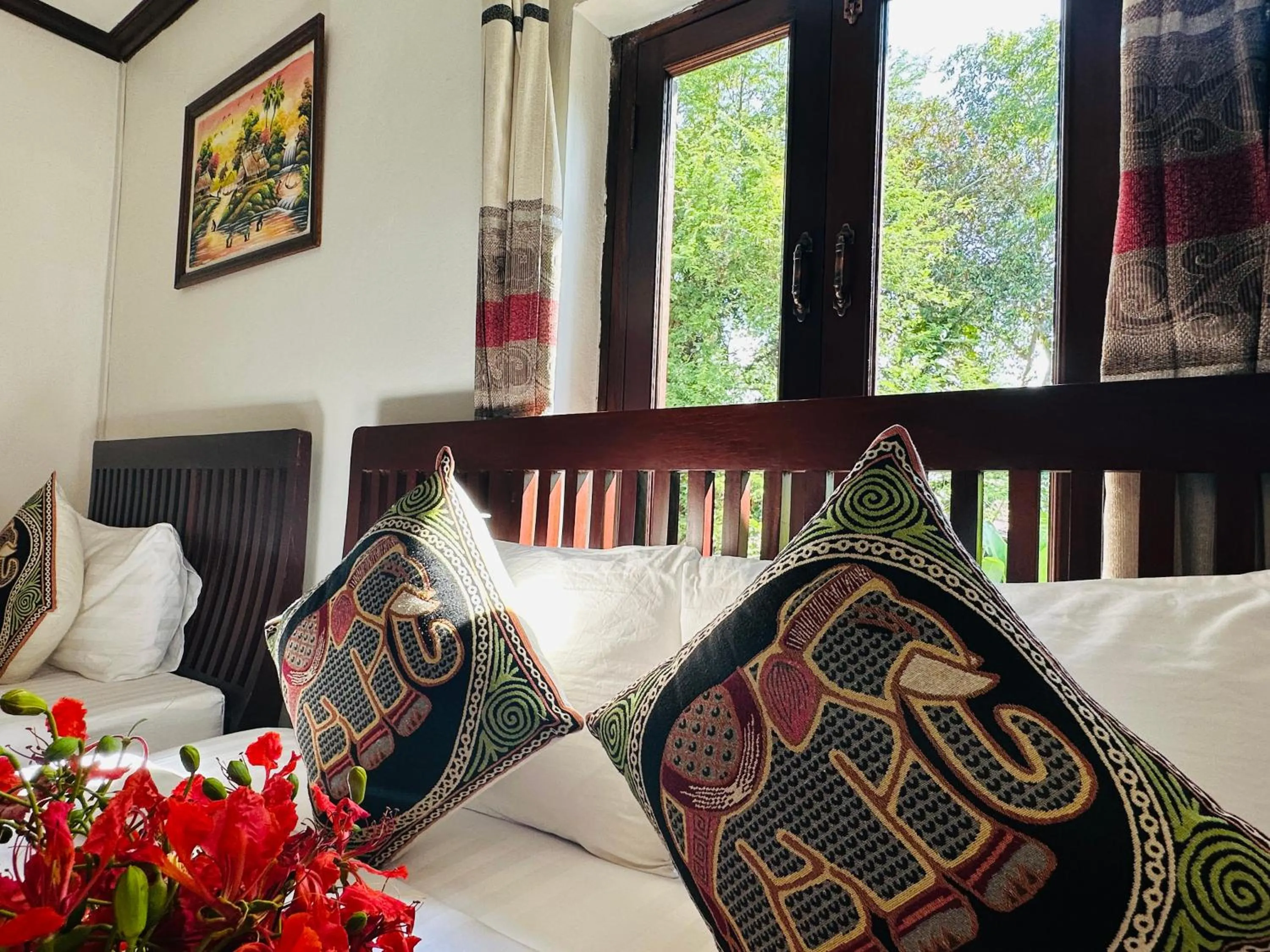 Bed in Thatsaphone Hotel