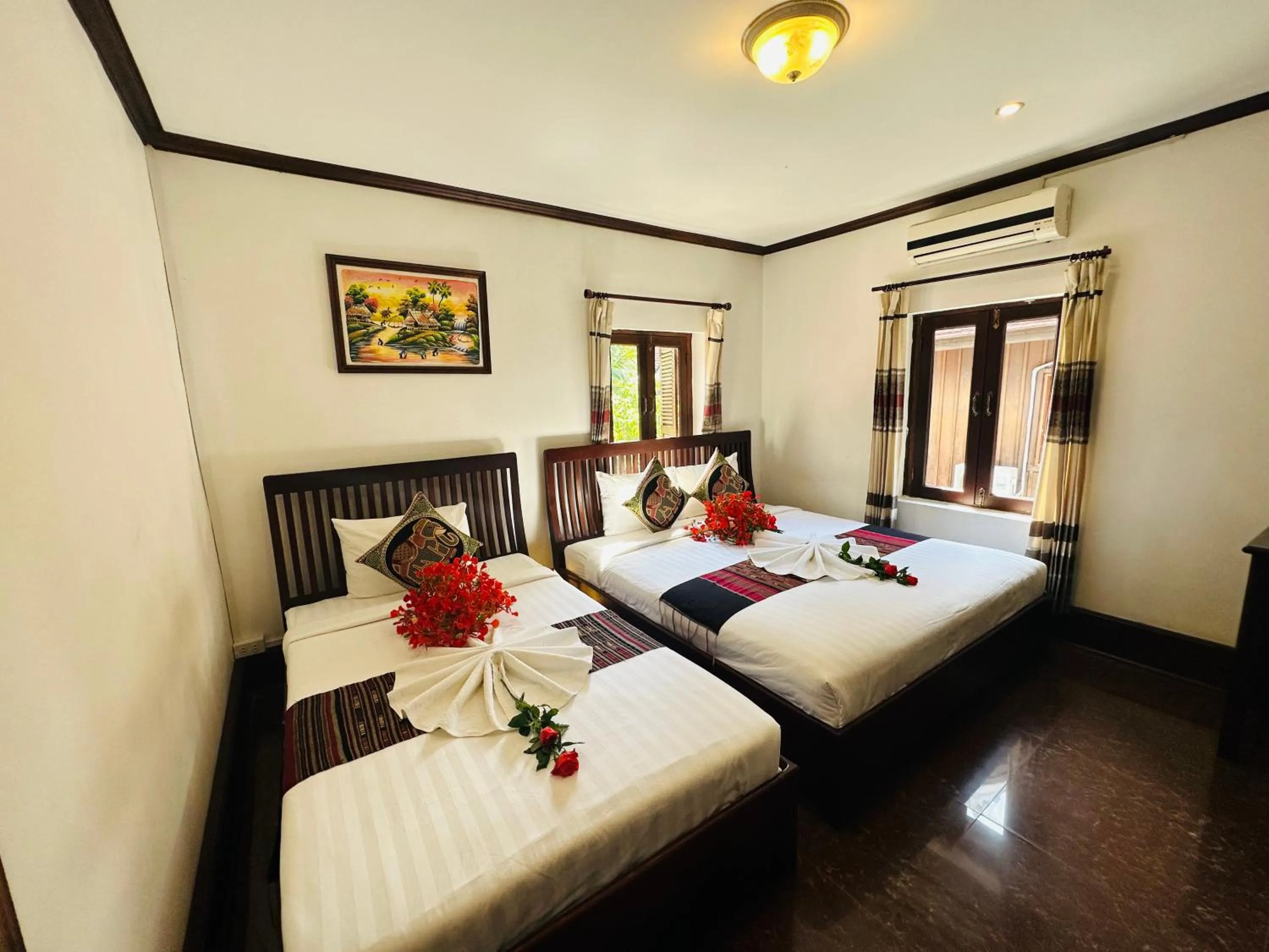 Bed in Thatsaphone Hotel