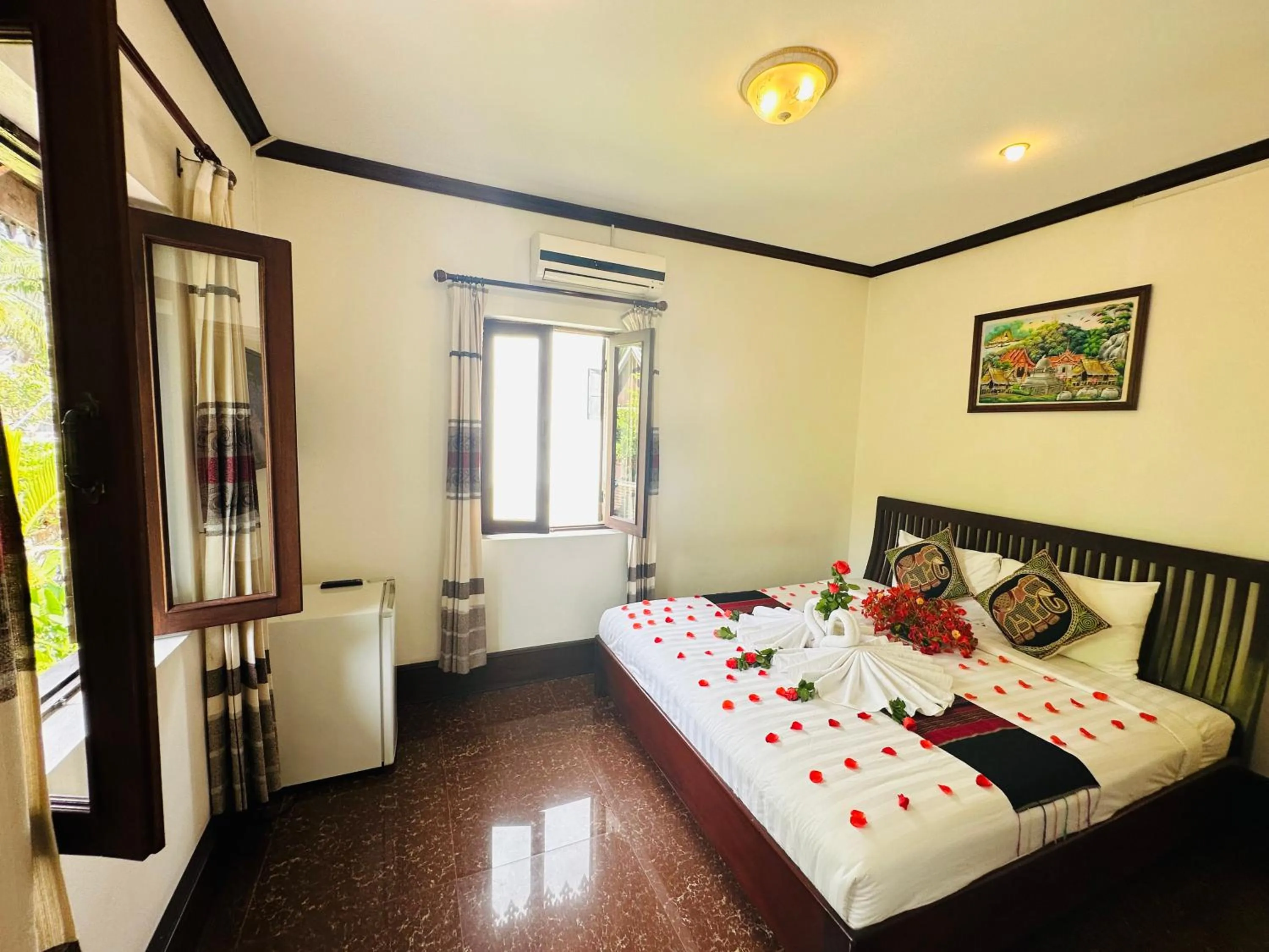 Bed in Thatsaphone Hotel