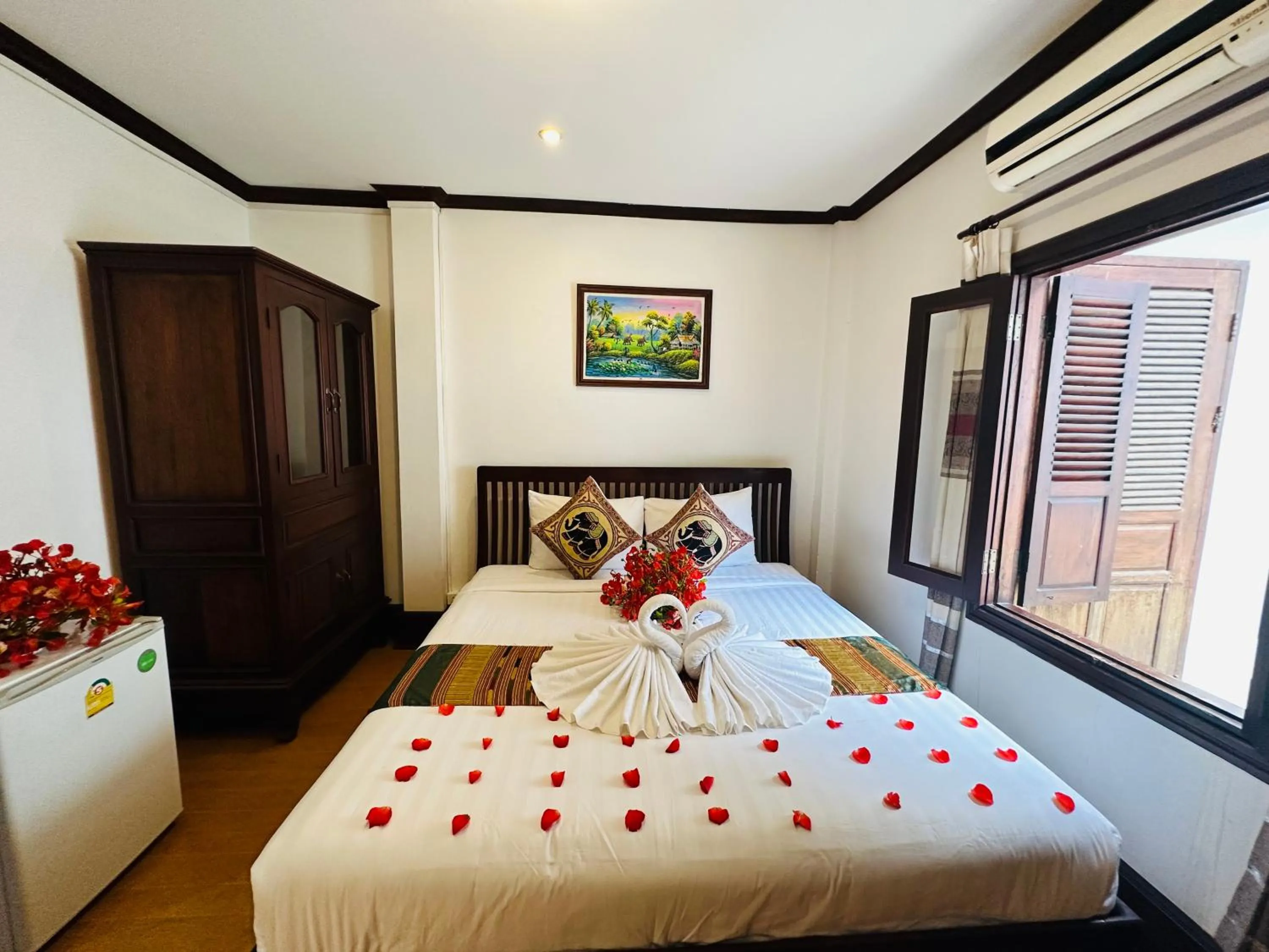 Bed in Thatsaphone Hotel