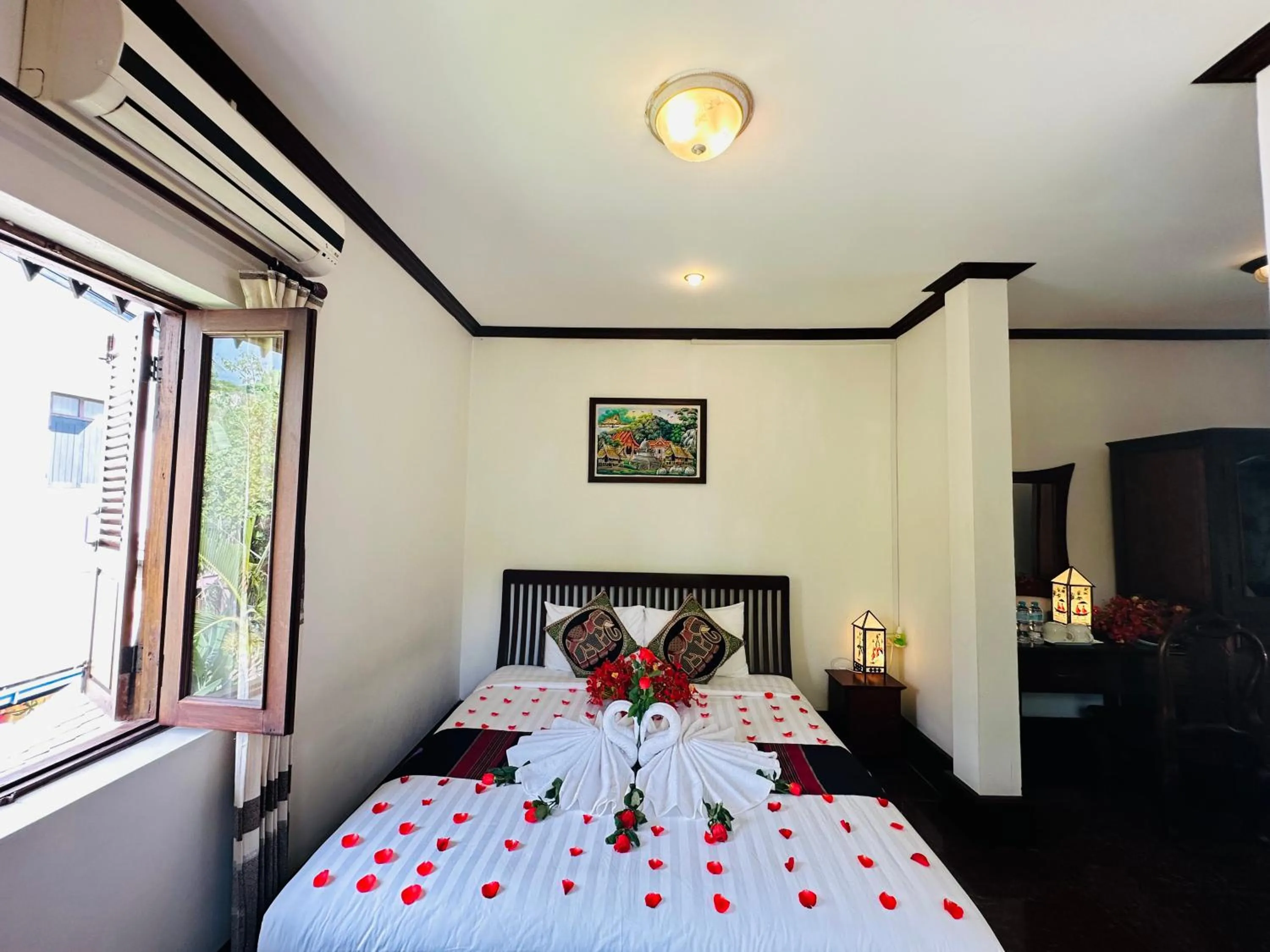 Bed in Thatsaphone Hotel