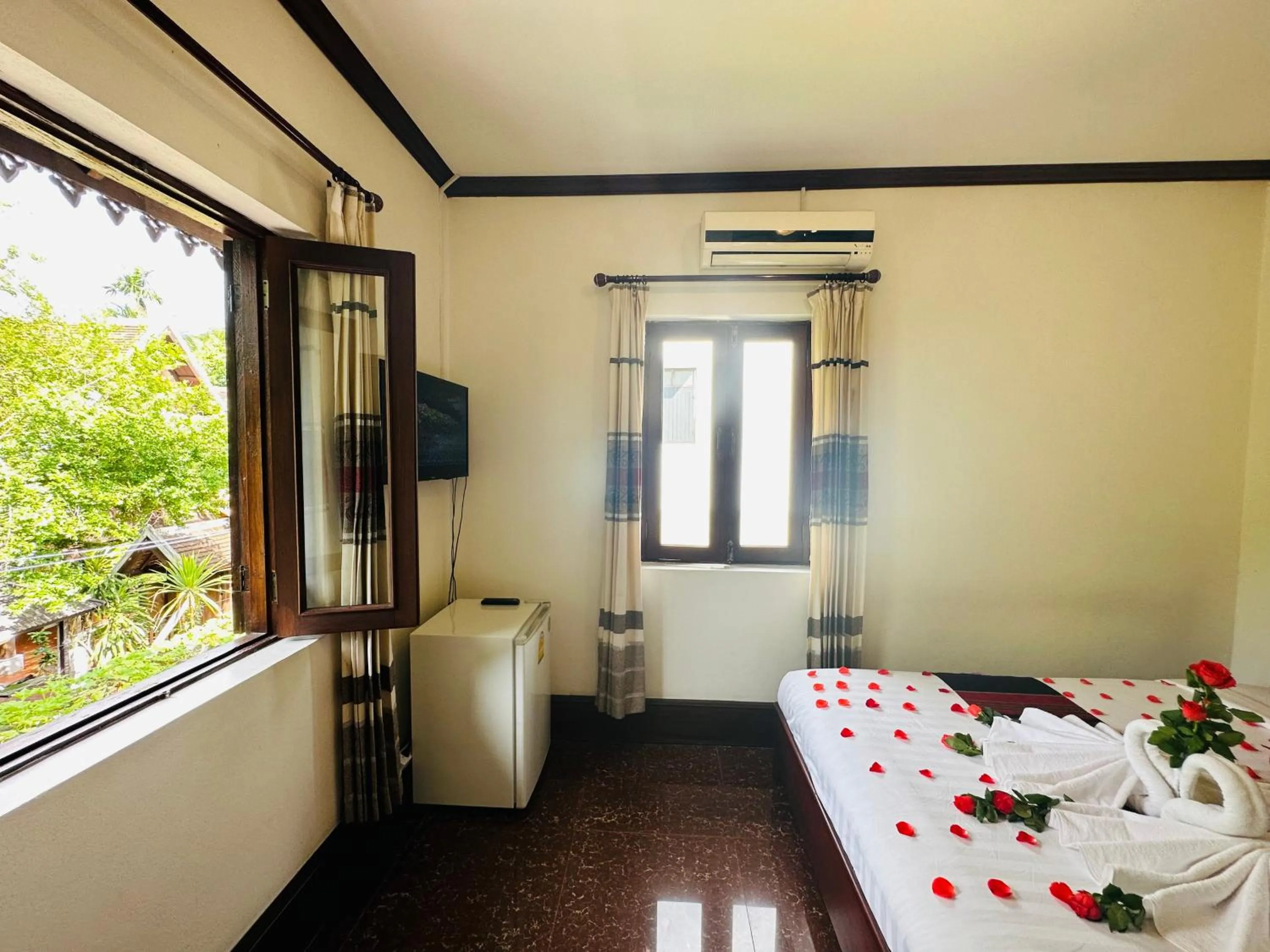 Bed in Thatsaphone Hotel