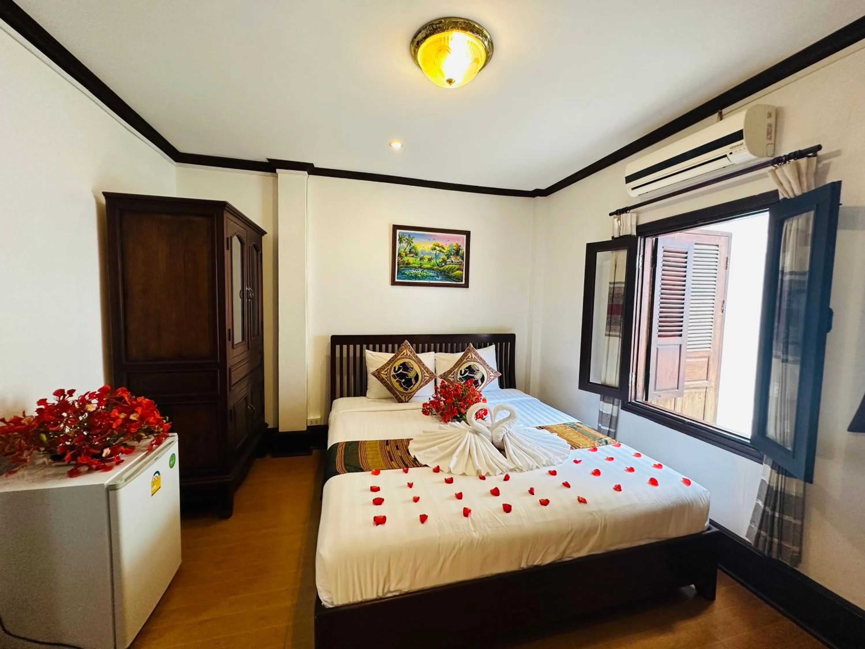 Bed in Thatsaphone Hotel