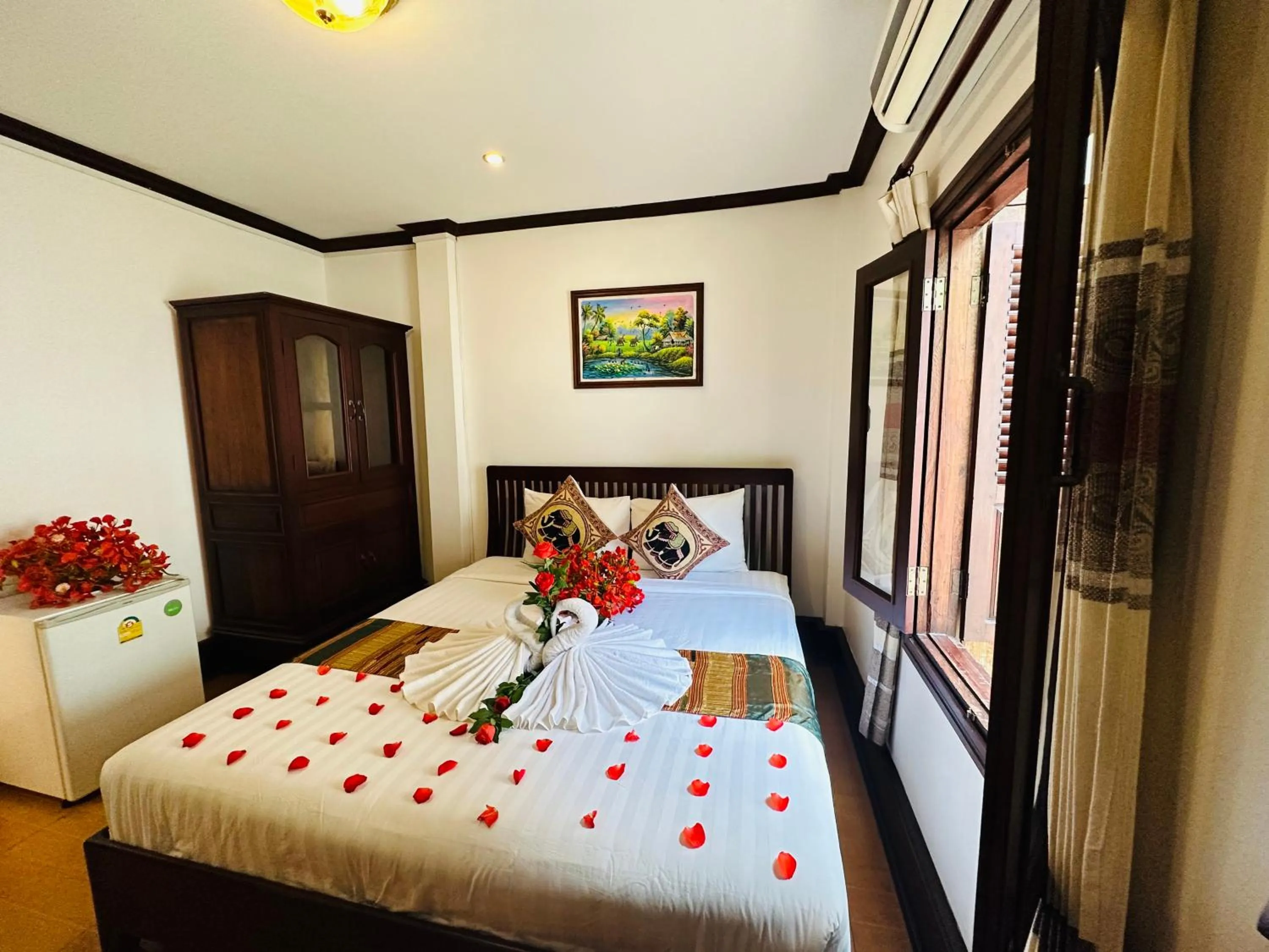 Bed in Thatsaphone Hotel