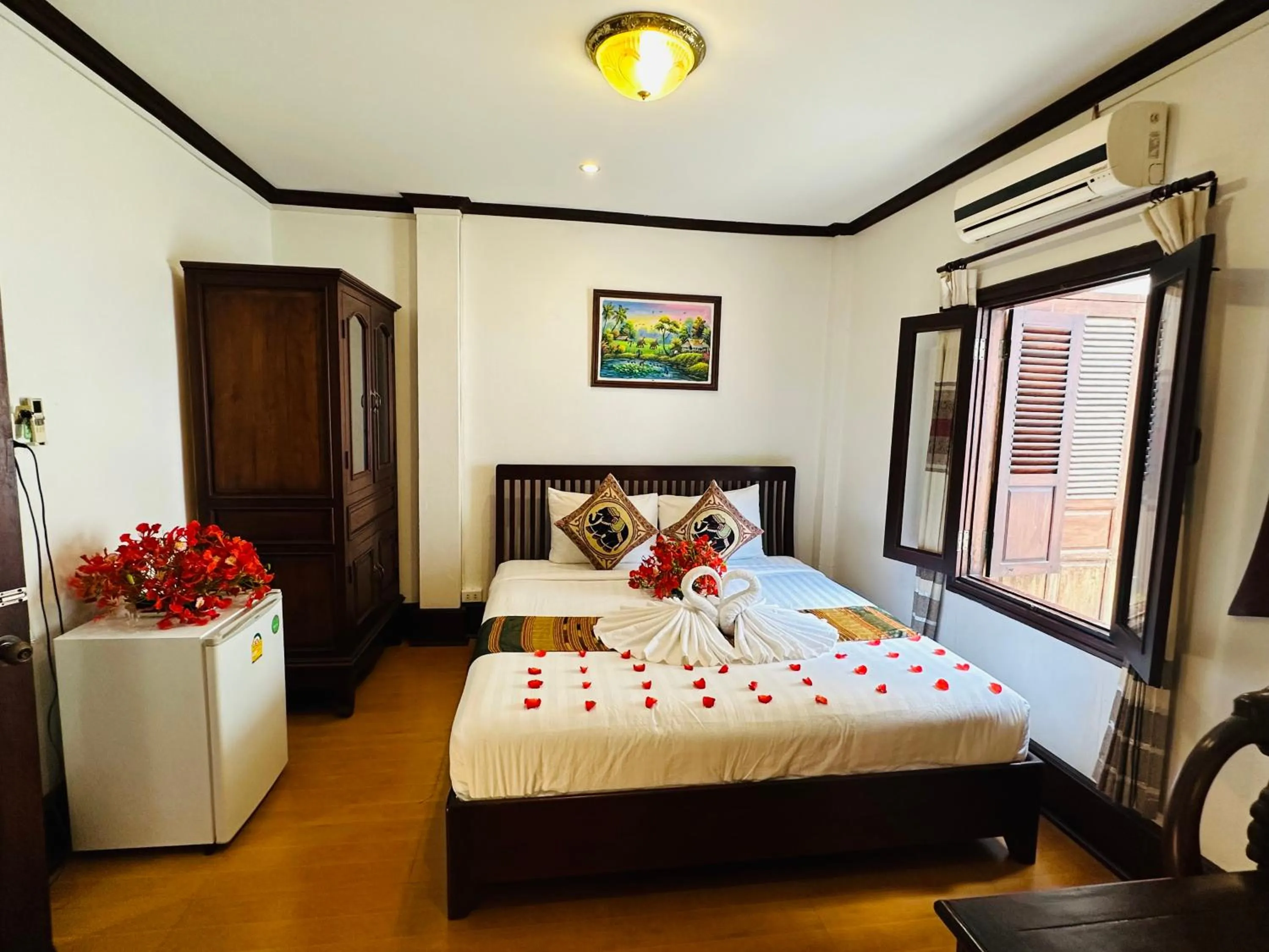 Bed in Thatsaphone Hotel