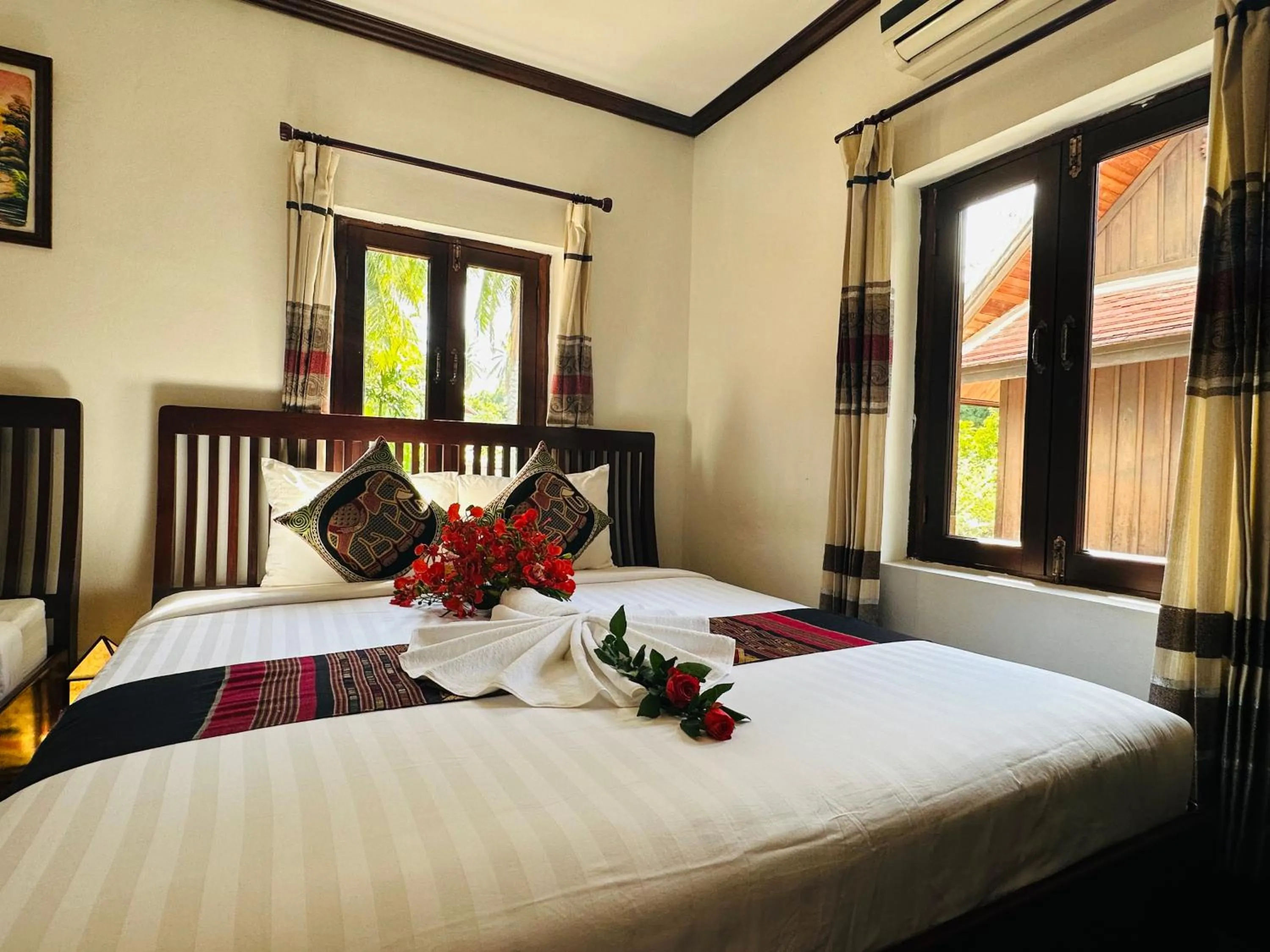 Bed in Thatsaphone Hotel