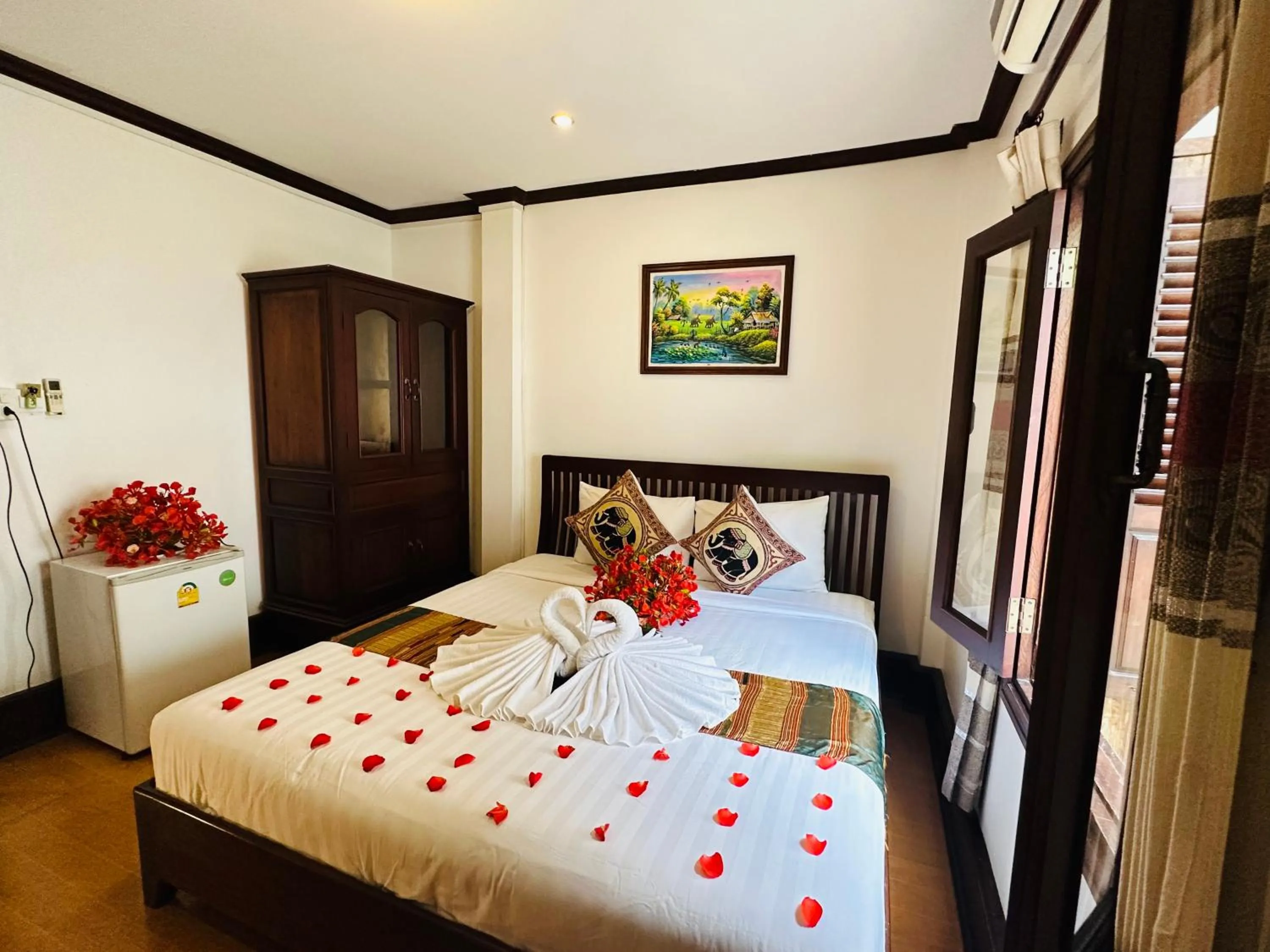 Bed in Thatsaphone Hotel