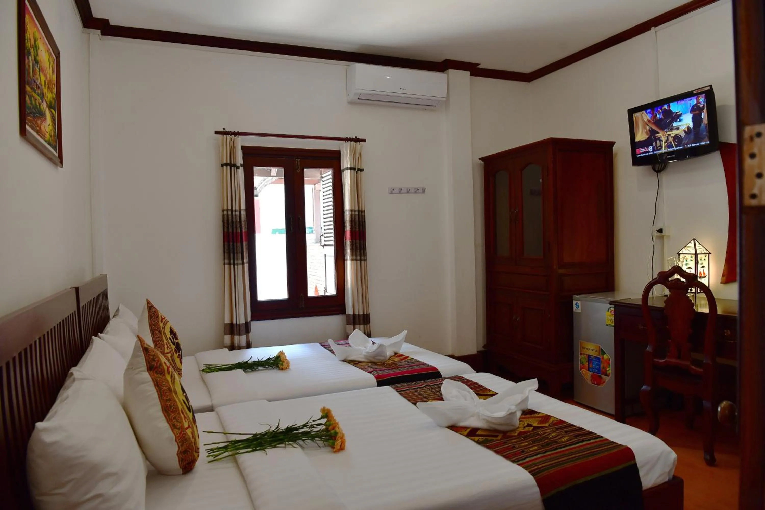 air conditioner, Bed in Thatsaphone Hotel