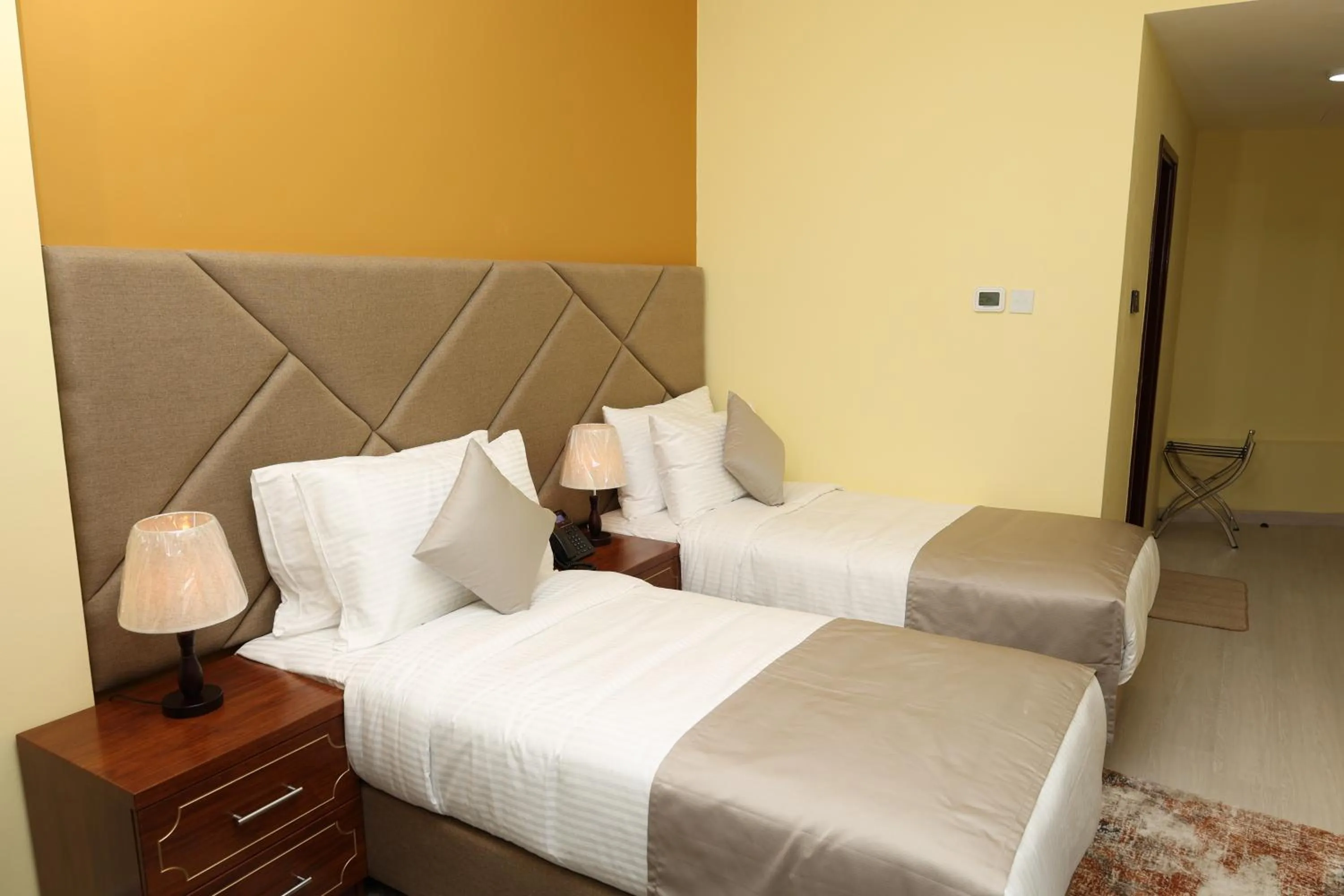 Bed in Grand Marino Hotel