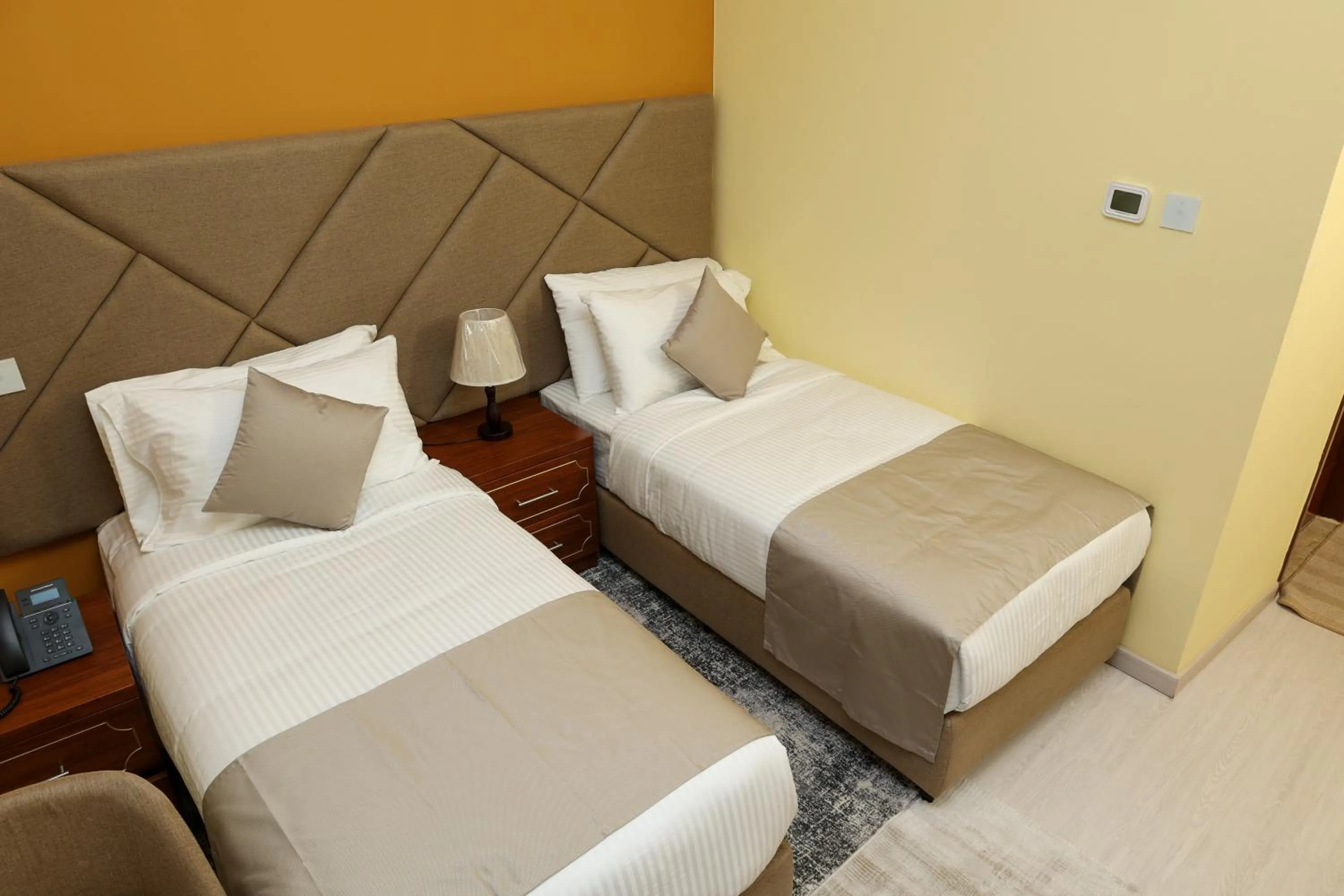 Bed in Grand Marino Hotel