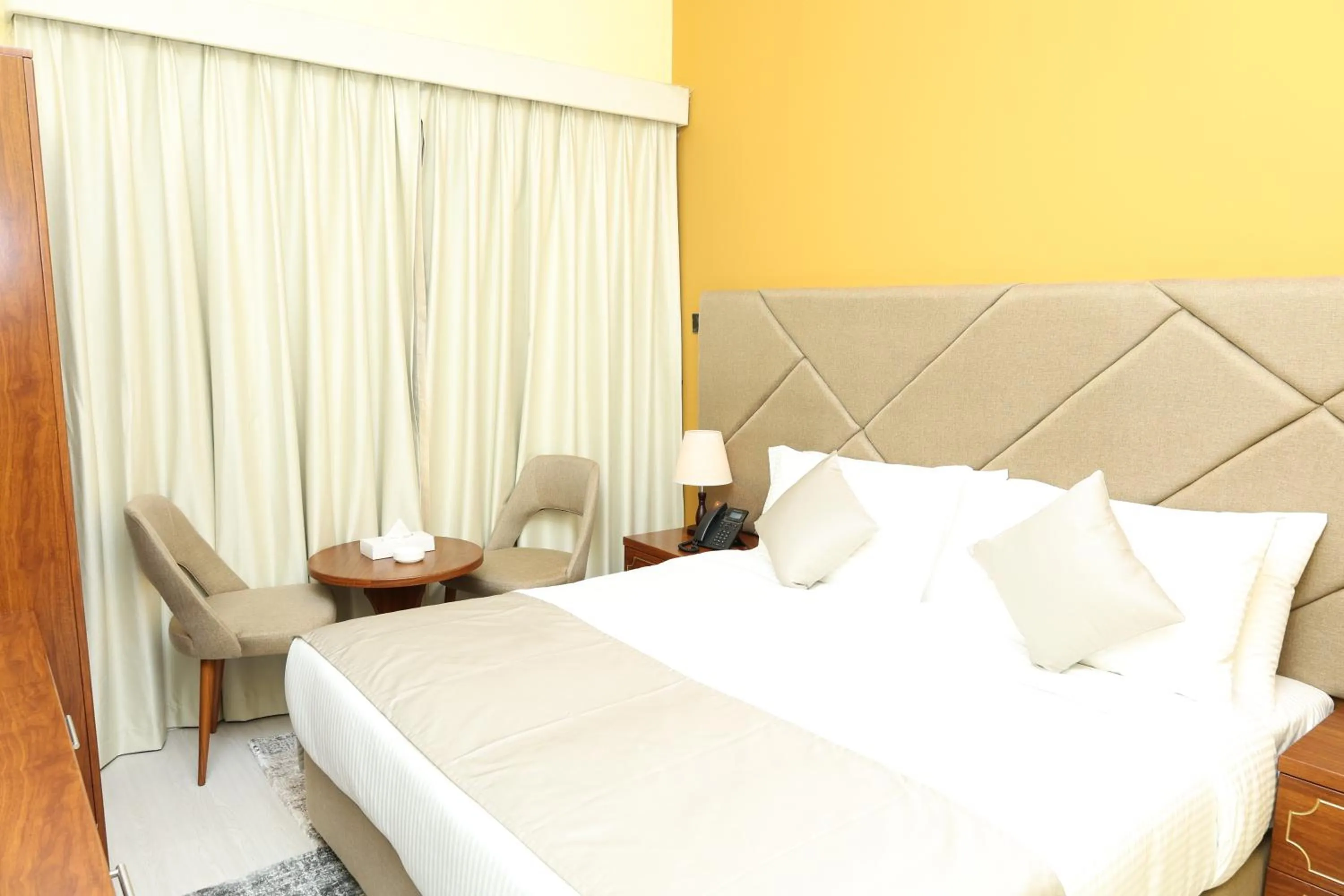 Bed in Grand Marino Hotel