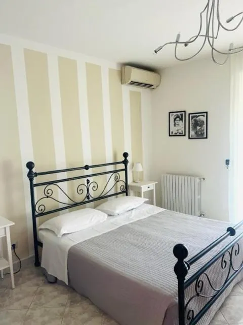 Bed in Cà Masawalsa Hotel