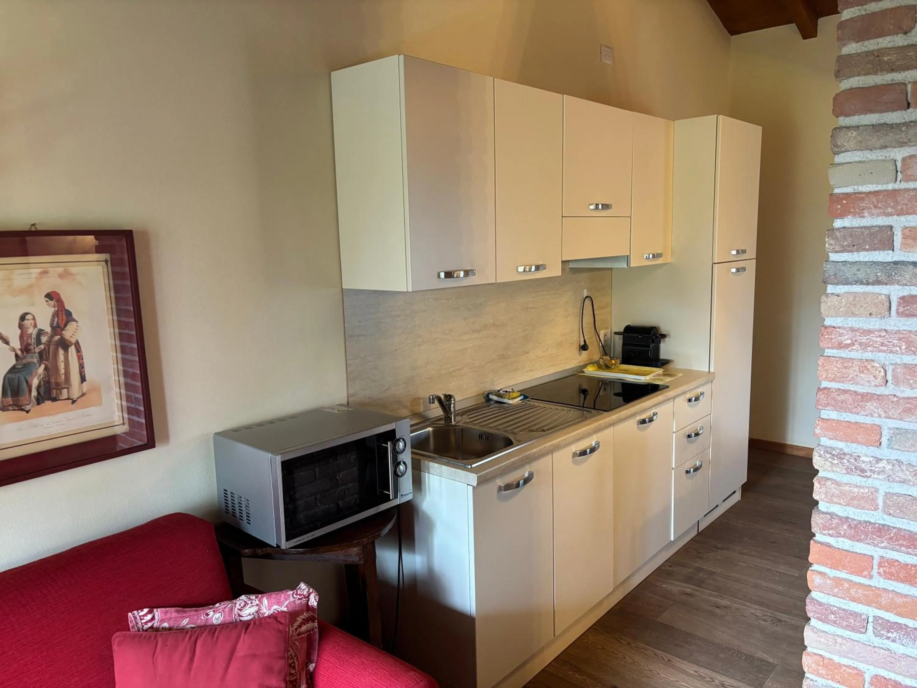 Kitchen or kitchenette in Apartments Relais Corte Paradiso