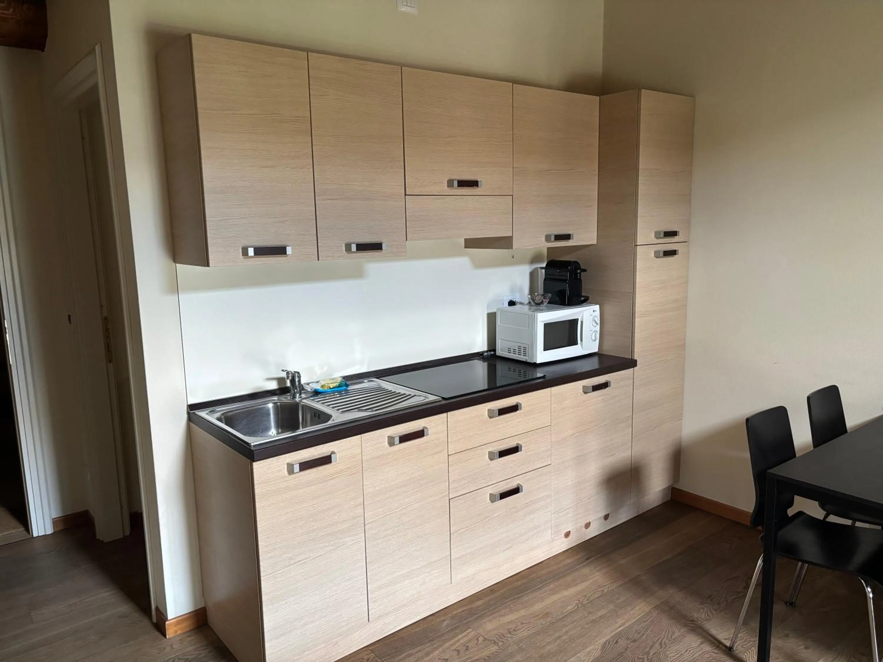 Kitchen or kitchenette in Apartments Relais Corte Paradiso