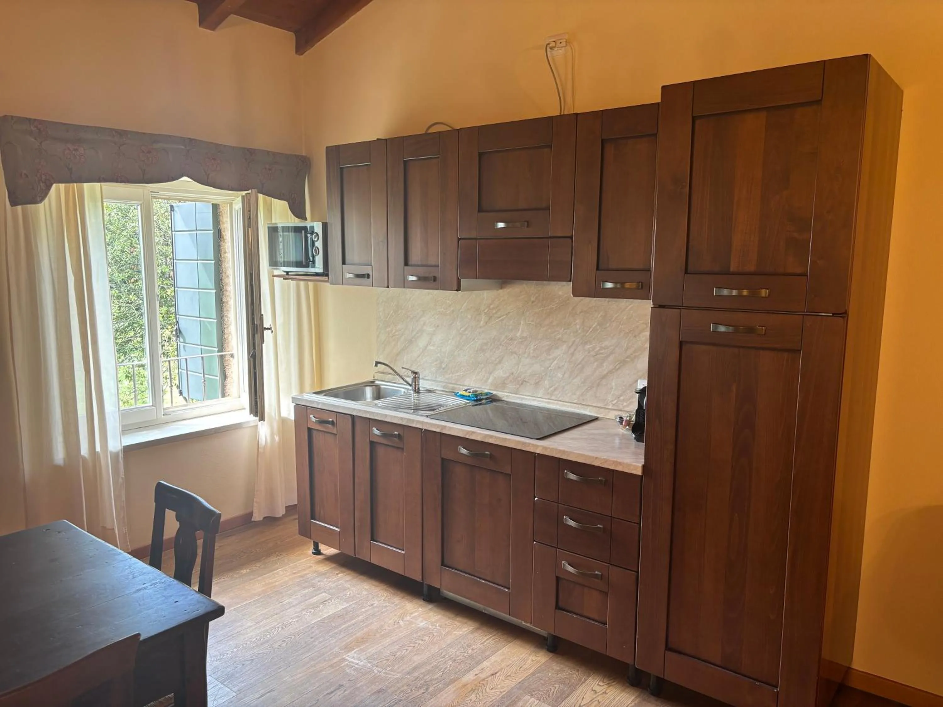 Kitchen or kitchenette in Apartments Relais Corte Paradiso