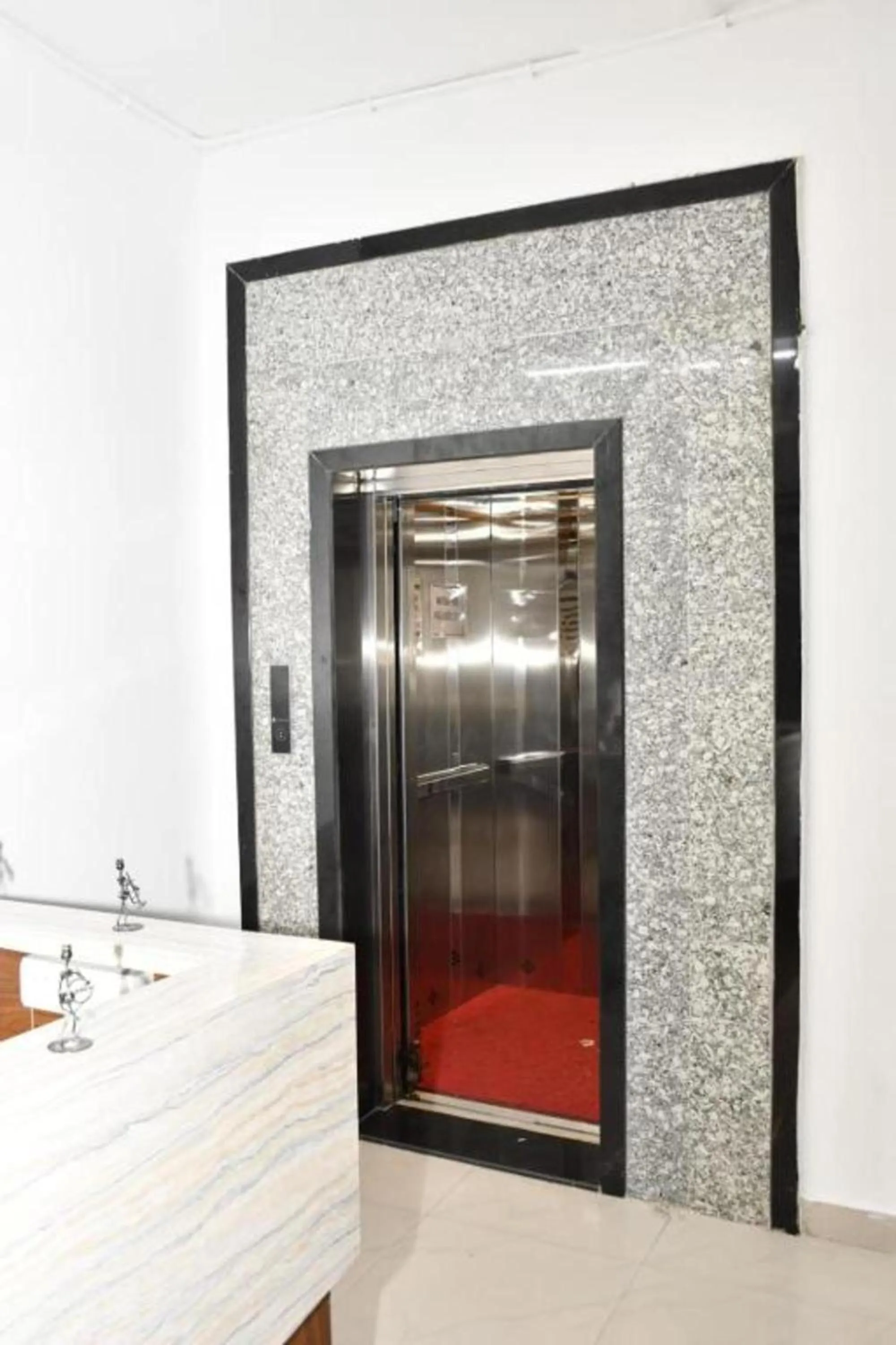 elevator in Hotel Lotus Inn near Udaipur City Railway Station