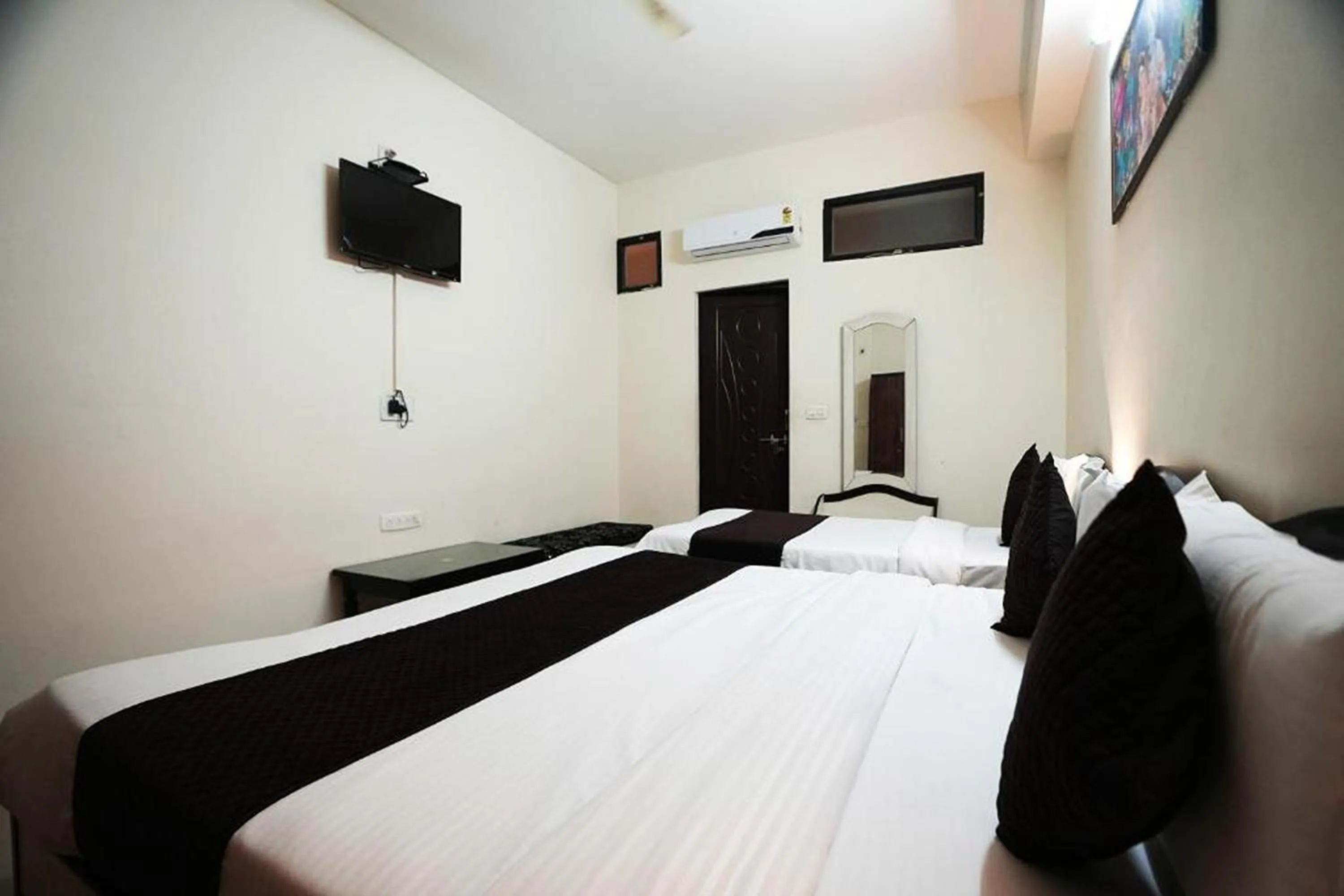 Bed in Hotel Lotus Inn near Udaipur City Railway Station