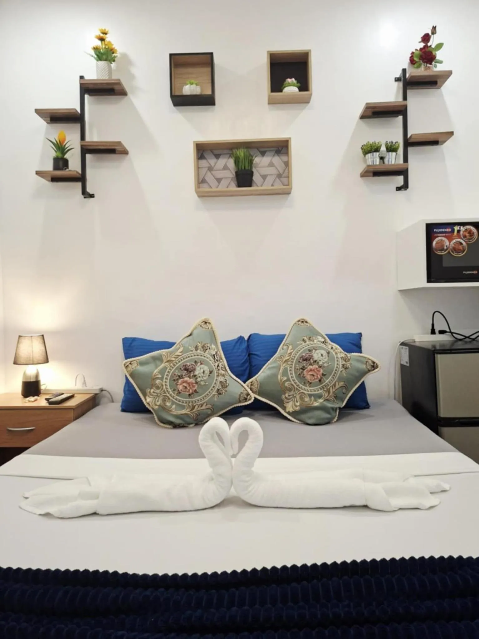 Bed in Bonsai Jacuzzi Suites