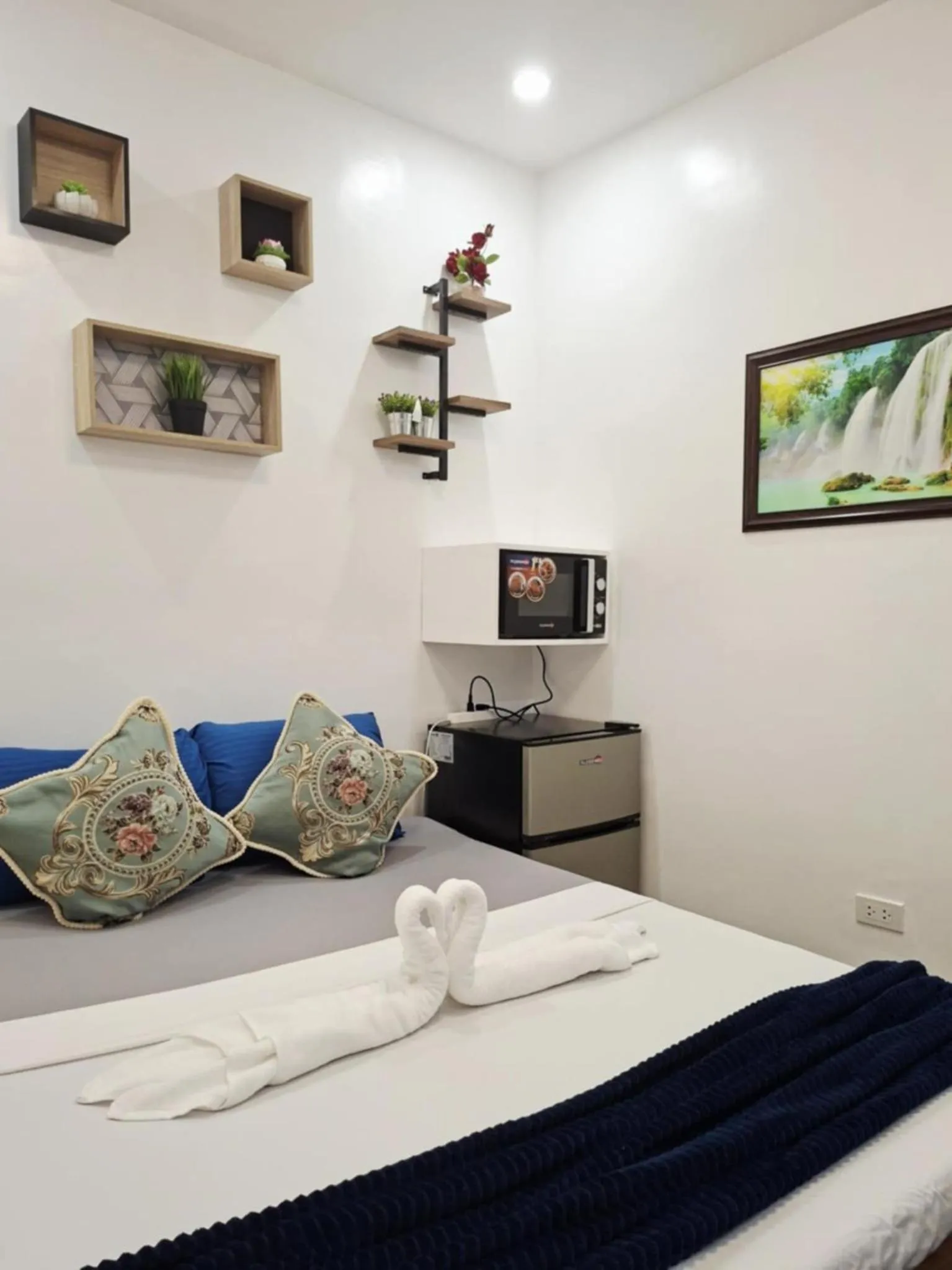 Bed in Bonsai Jacuzzi Suites