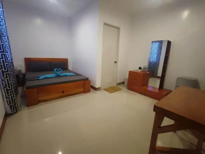 Bed in Bonsai Jacuzzi Suites