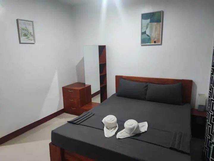 Bed in Bonsai Jacuzzi Suites