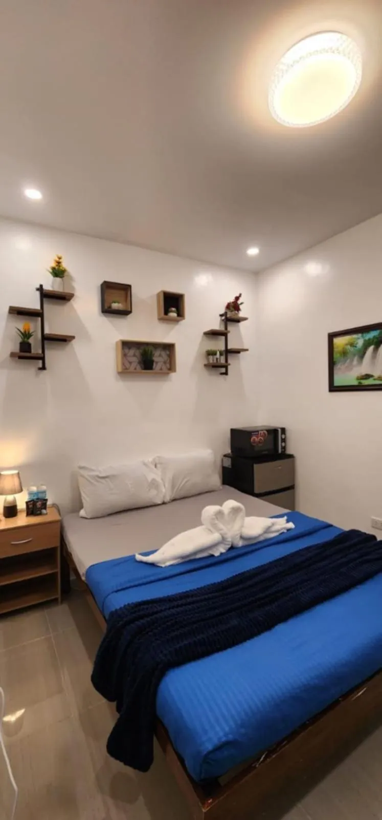 Bed in Bonsai Jacuzzi Suites