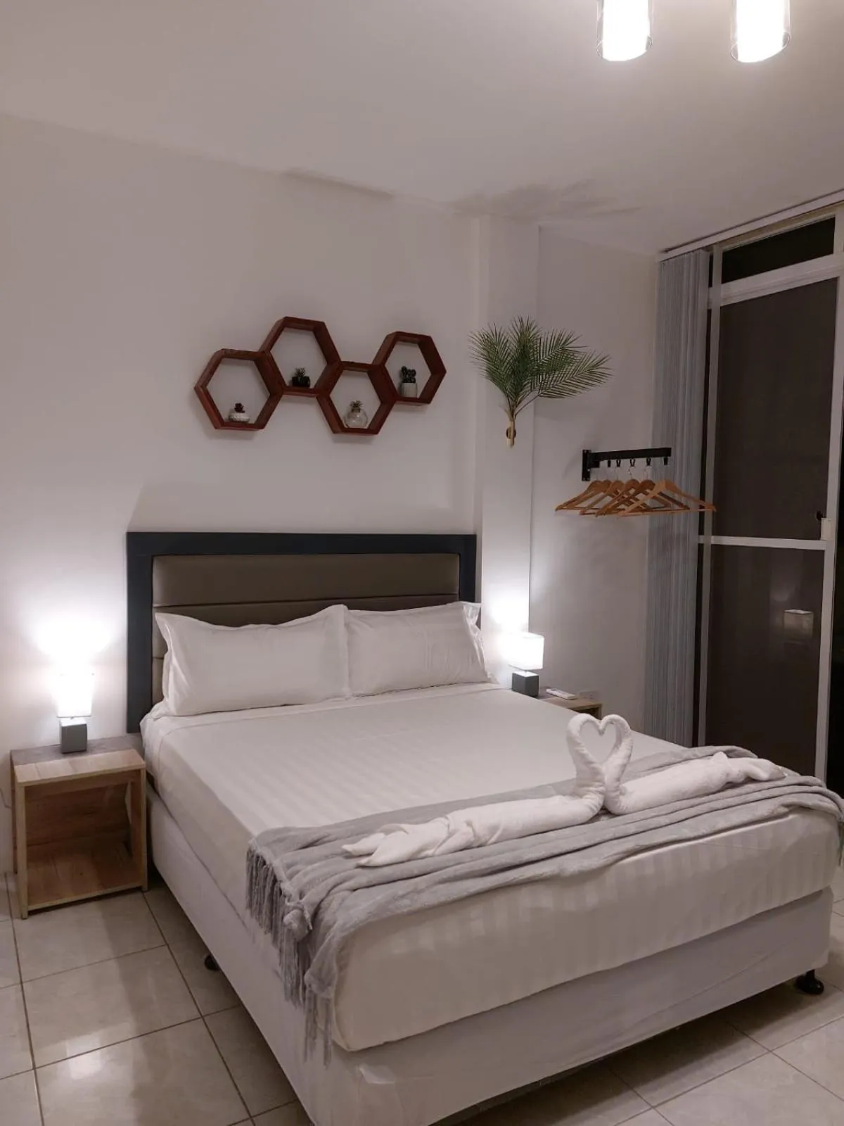 Bed in Bonsai Jacuzzi Suites